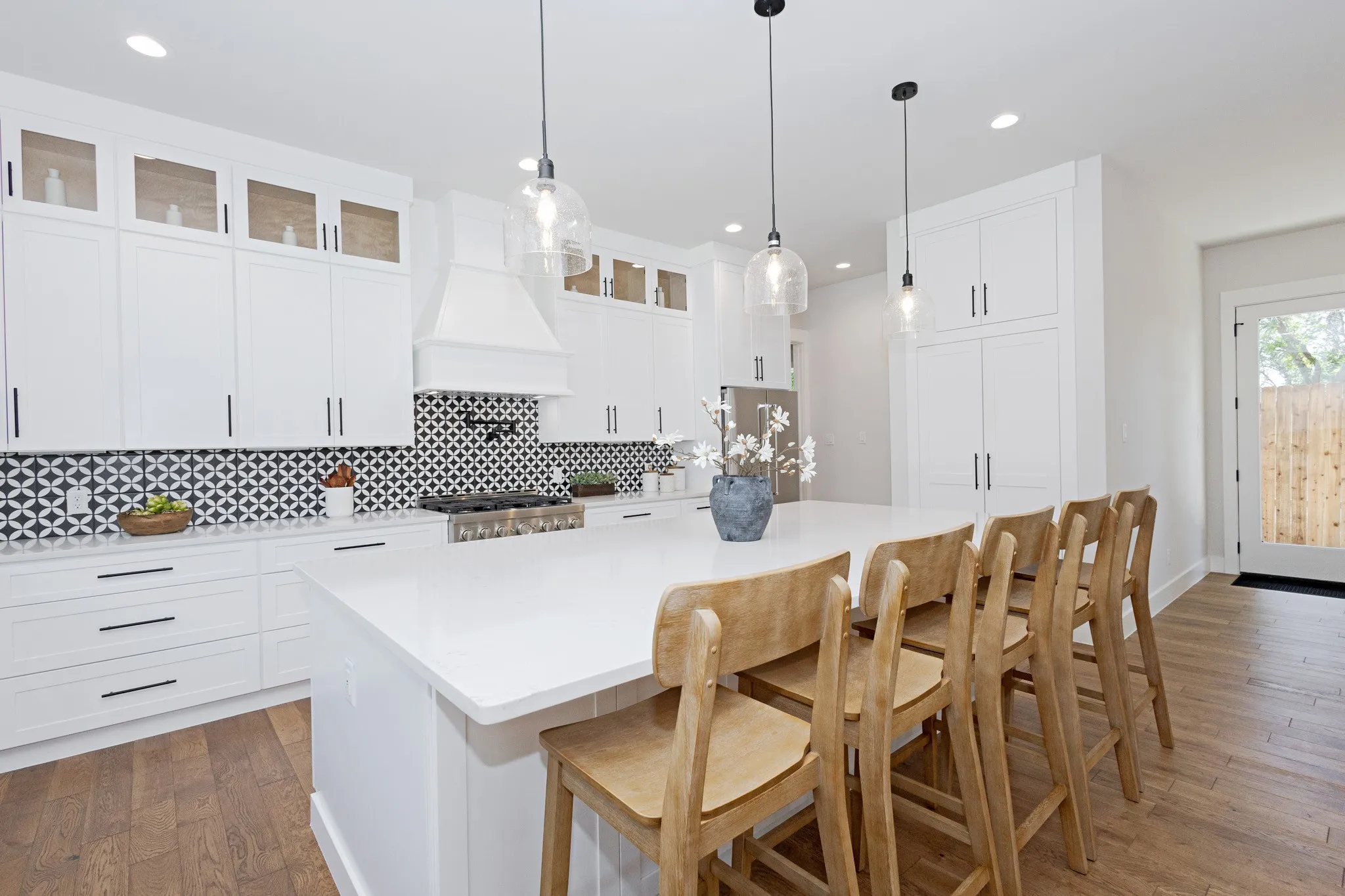 Clean lines and Premium Finishes bring this kitchen to life! There is plenty of prep space, storage and style in every corner.