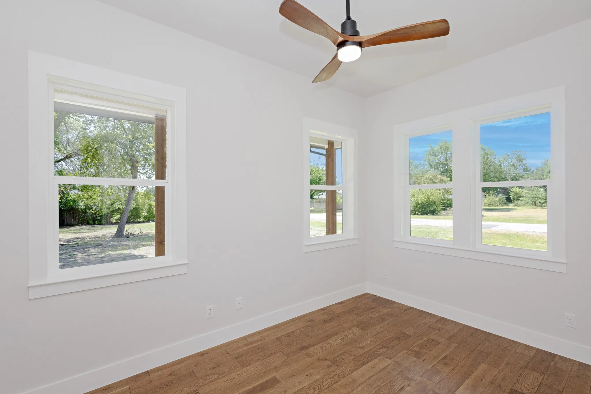  The spacious and versatile downstairs bedroom offers a walk-in closet complete with Shelving and a Hidden Storage Area with Motion-Sensor Lighting.