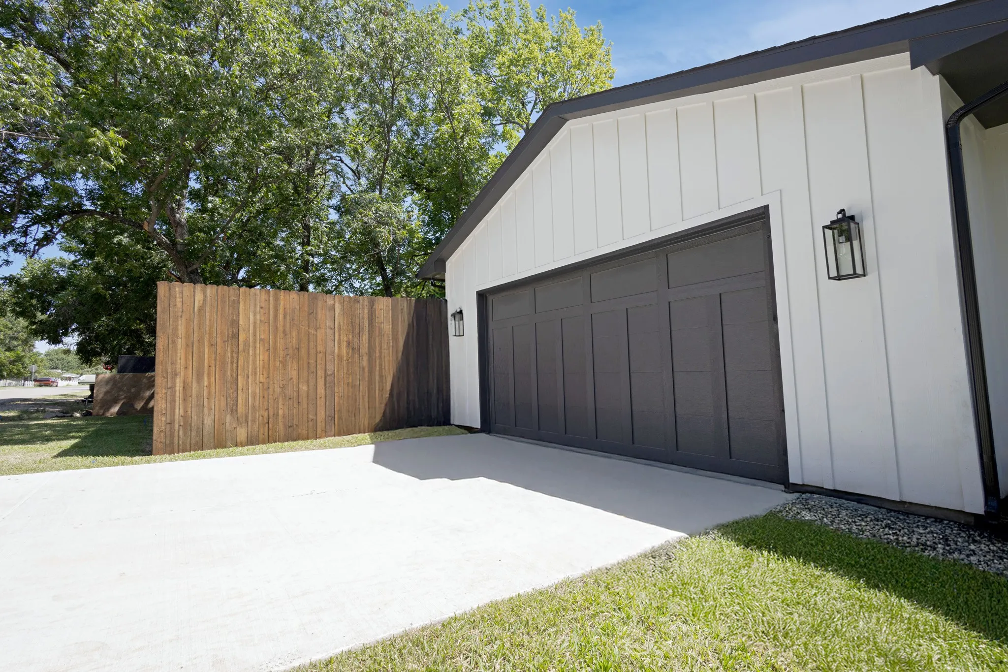 2-car Insulated Garage and Garage Door with Lift Master Quiet, Side-Installed Garage Door Opener Equipped With Auto Lock and Battery Back-Up System.