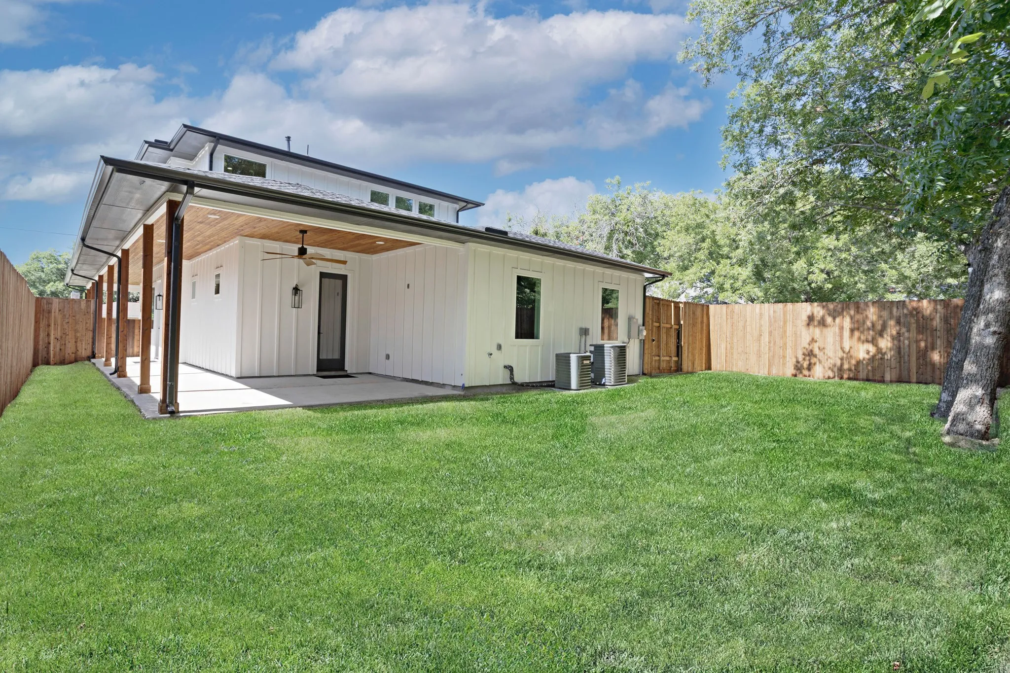Large and mostly shaded backyard with a Healthy St. Augustine Lawn, Sprinkler System, 8ft Cedar Privacy Fencing , Plumbed and Wired for a Gas Generator.