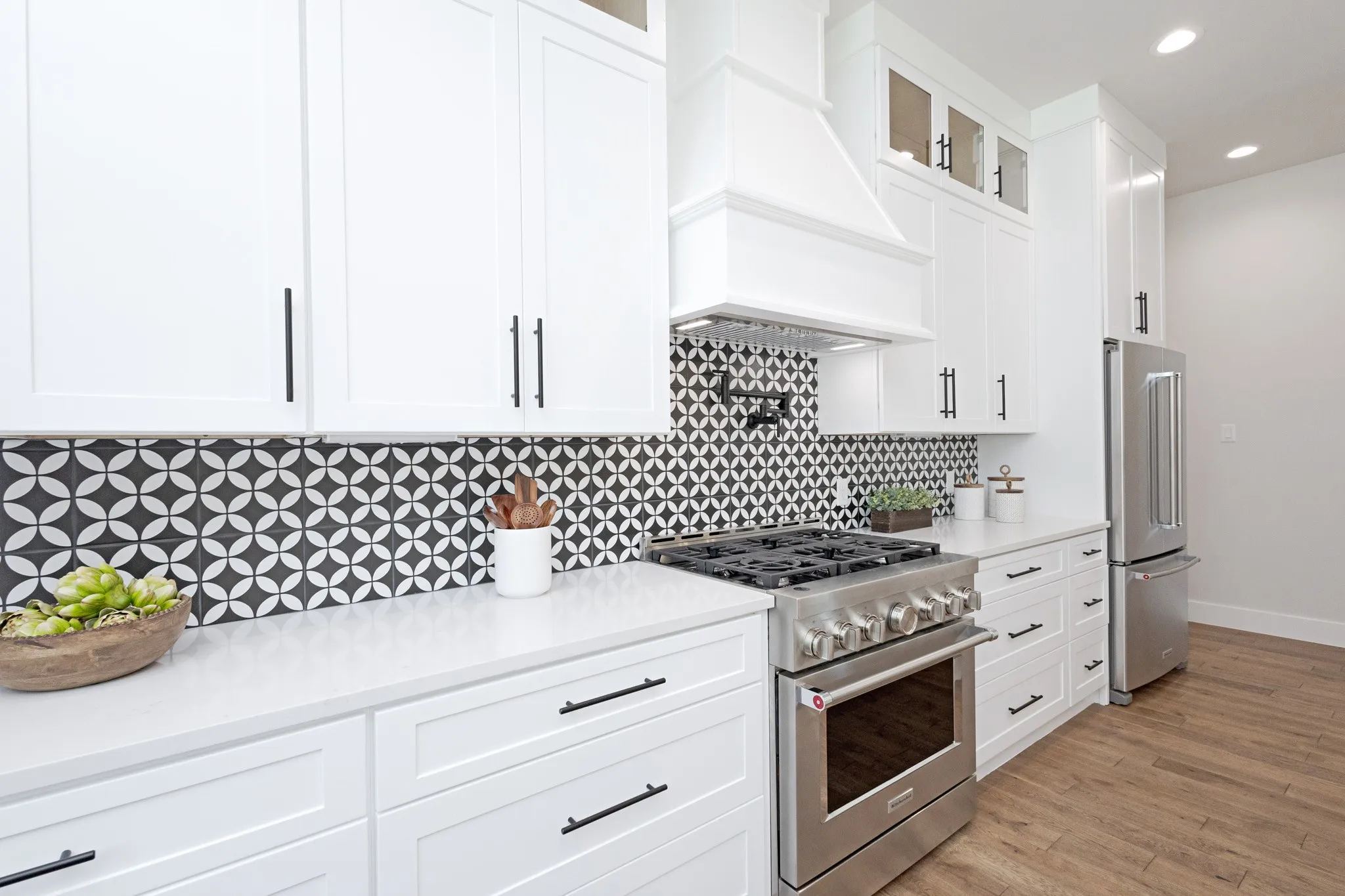 A true Chef’s Kitchen with Premium Appliances, a Pot Filler, and Designer Finishes.