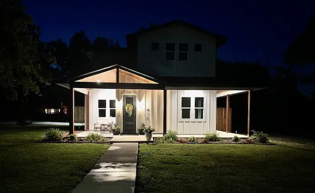 Show-stopping Curb Appeal day or night, highlighted by elegant Exterior Dimmable Lighting.  Evenings feel magical!