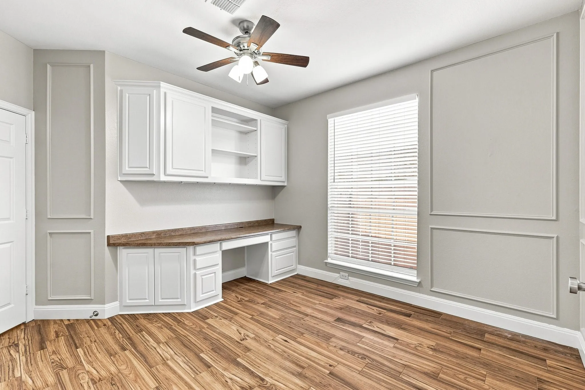 Also at the front of the home is a designated Office Space with built in desk and storage! Perfect for staying at home and working or a homework room. Another option could be duel flex space for work and at home gym.