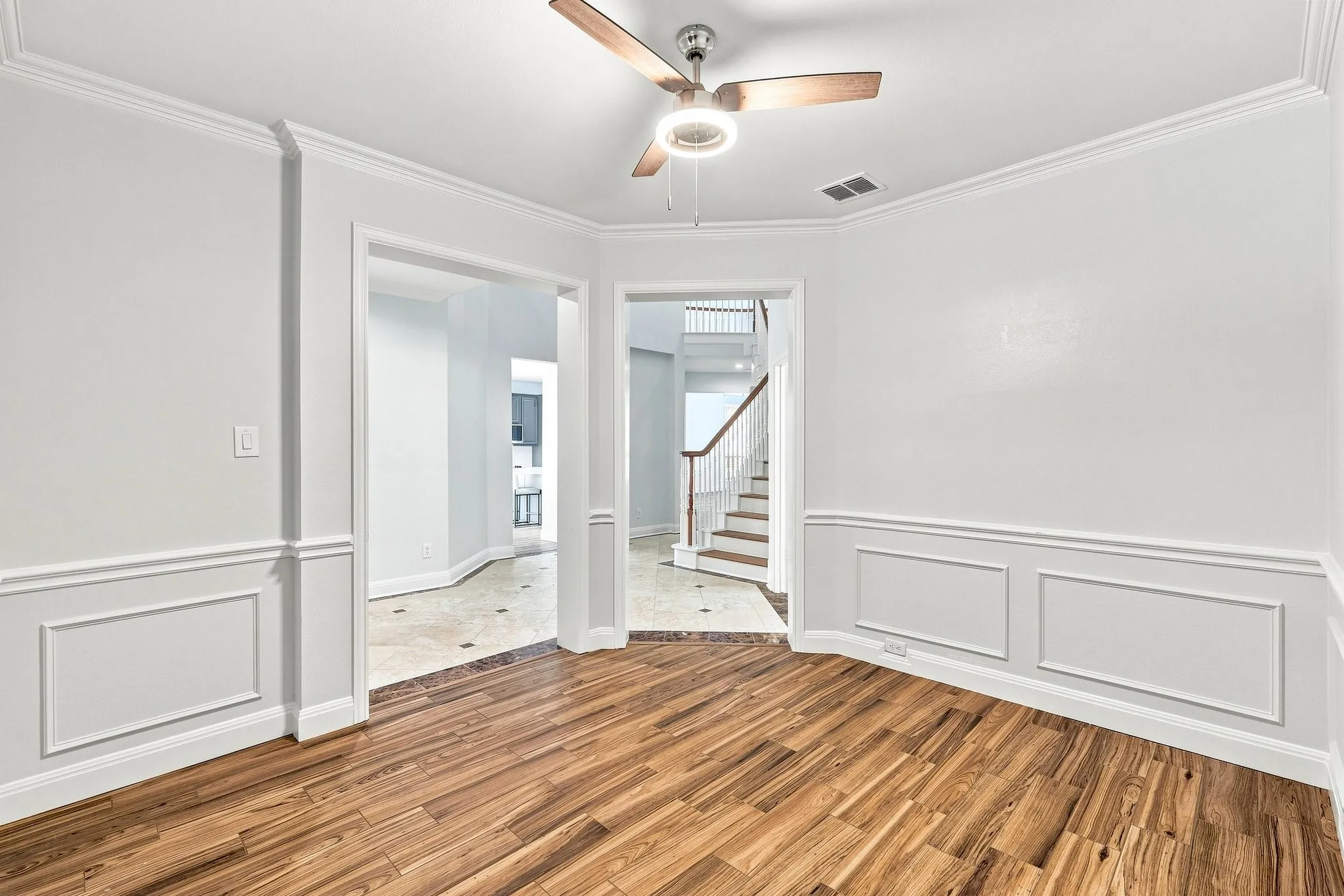 Another view of the formal Dining Room showing off the gorgeous flooring!
