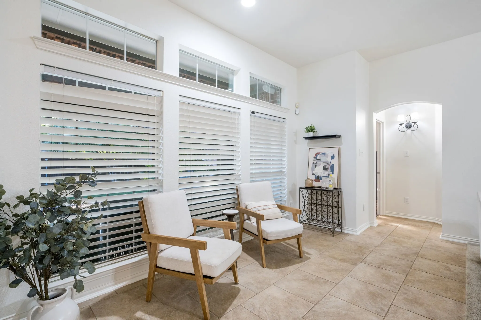 This is a designated area you can play chess, make it a reading nook, games, mahjong or create a dry bar cart area, or read and enjoy the sun spilling on you.