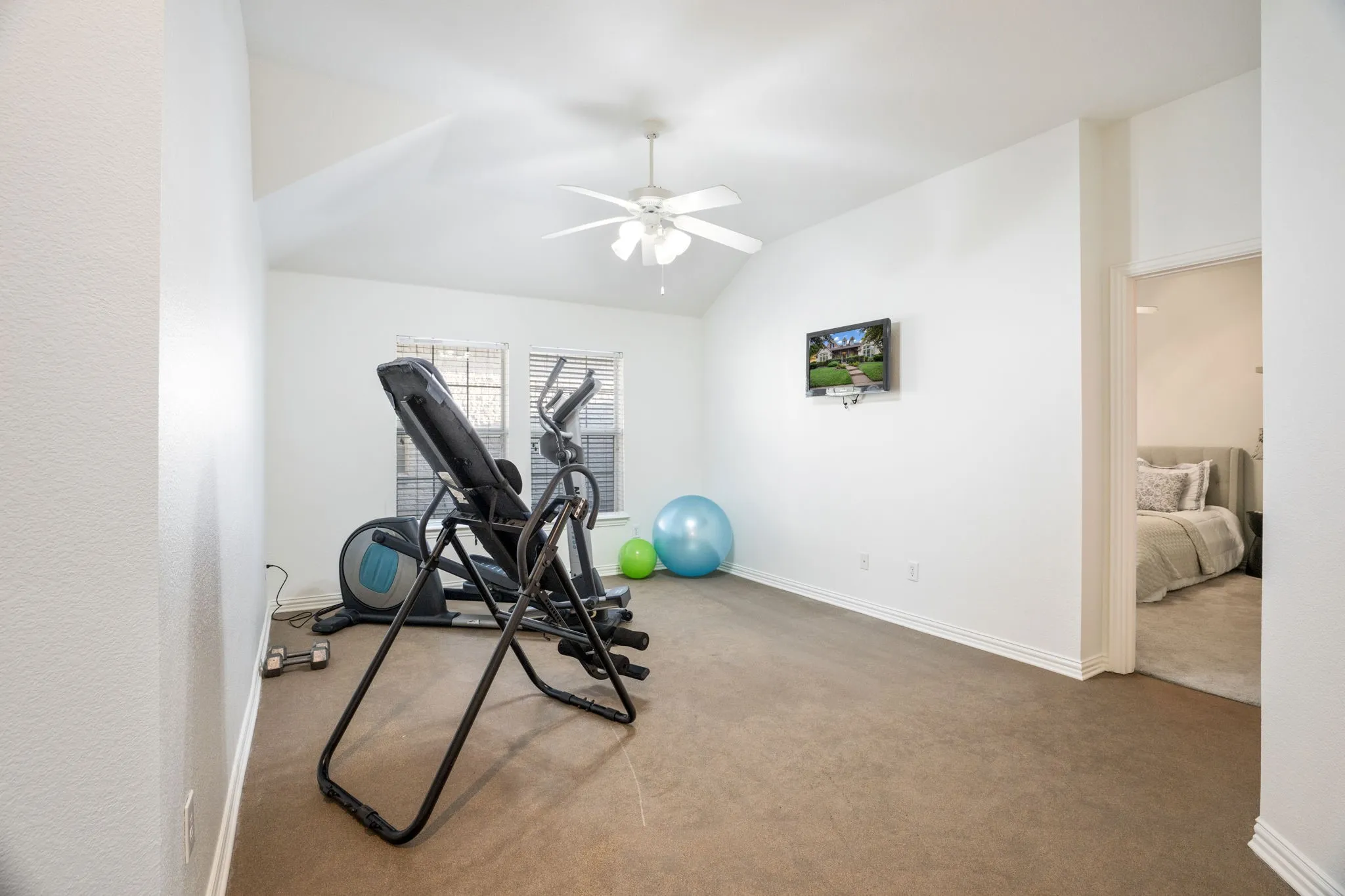 This room is specifically designed to work out and have a home weight system or equipment, it has specific flooring for this and is closed off with a pocket sliding door. You can also use it as a flex space for an additional second office at home or an additional playroom!! Gameroom down without sacrificing game room up.