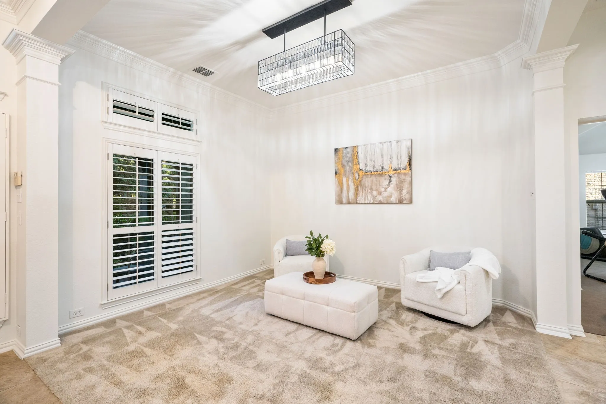 Great conversation or dining room with Pottery Barn Crystal Chandelier  also great for mahjong or morning coffee by the window.