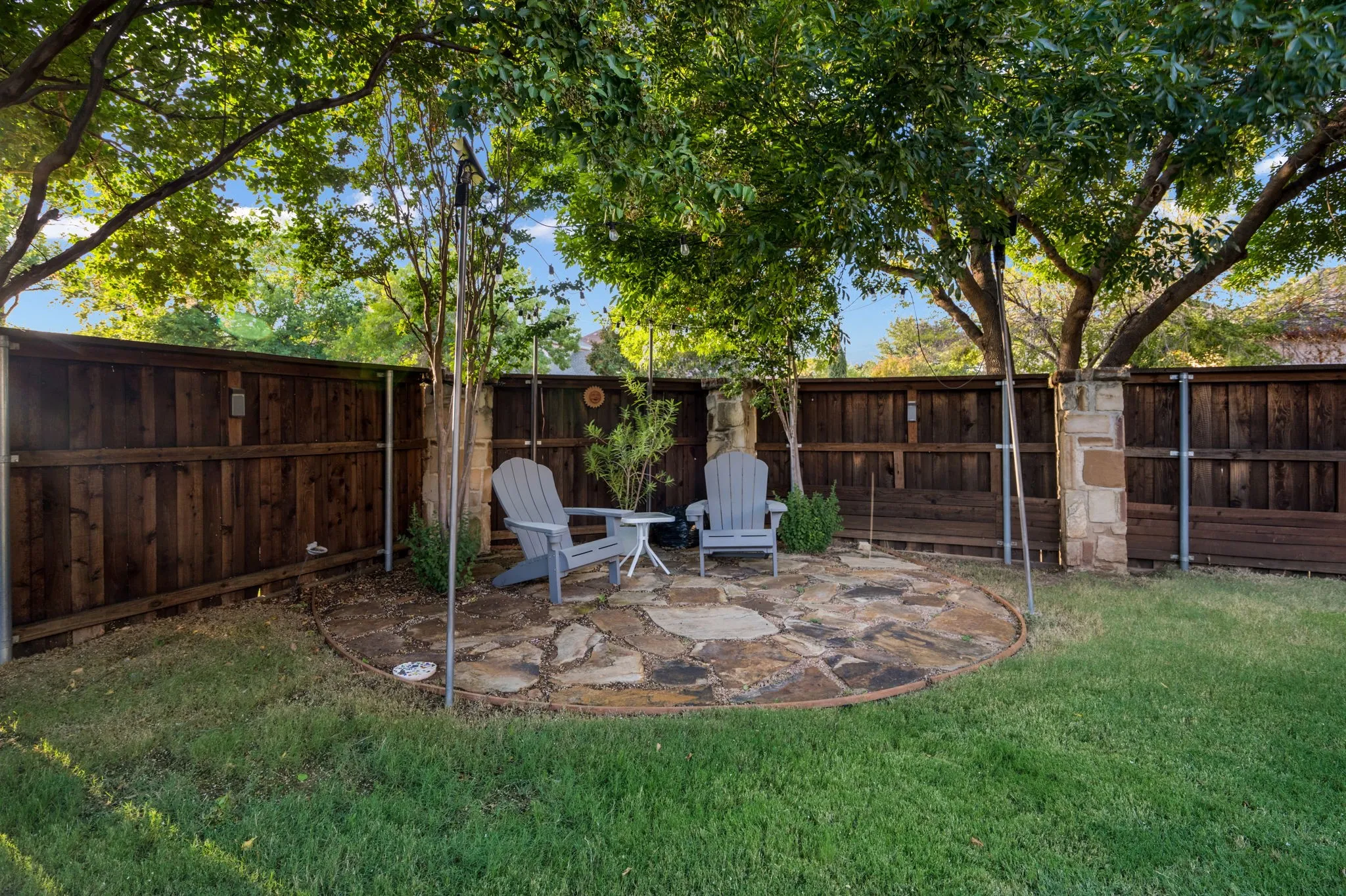 This would be a great spot for your own fire pit and several adirondack chairs!!