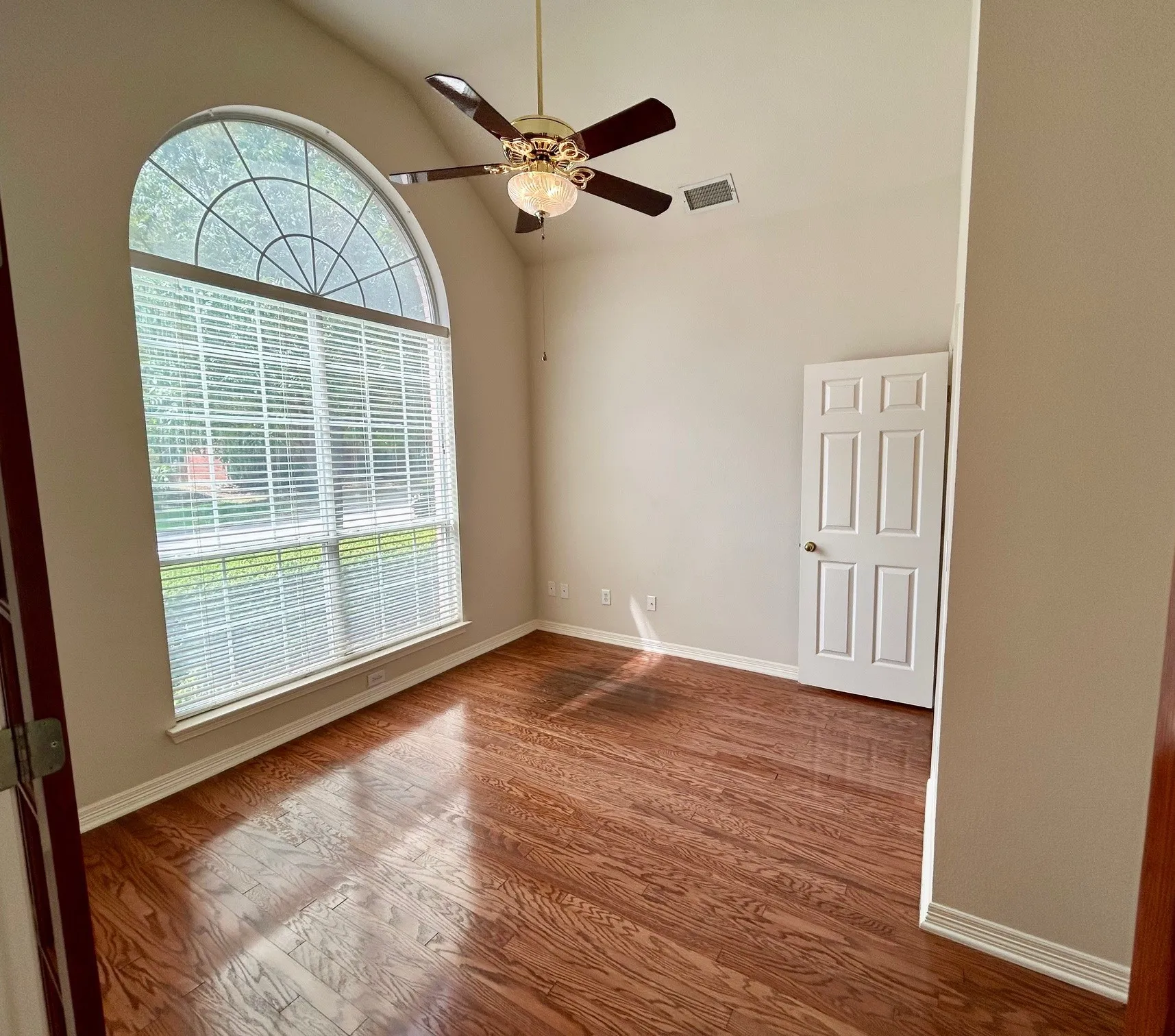 used as office with french doors has another door exiting to hall bath