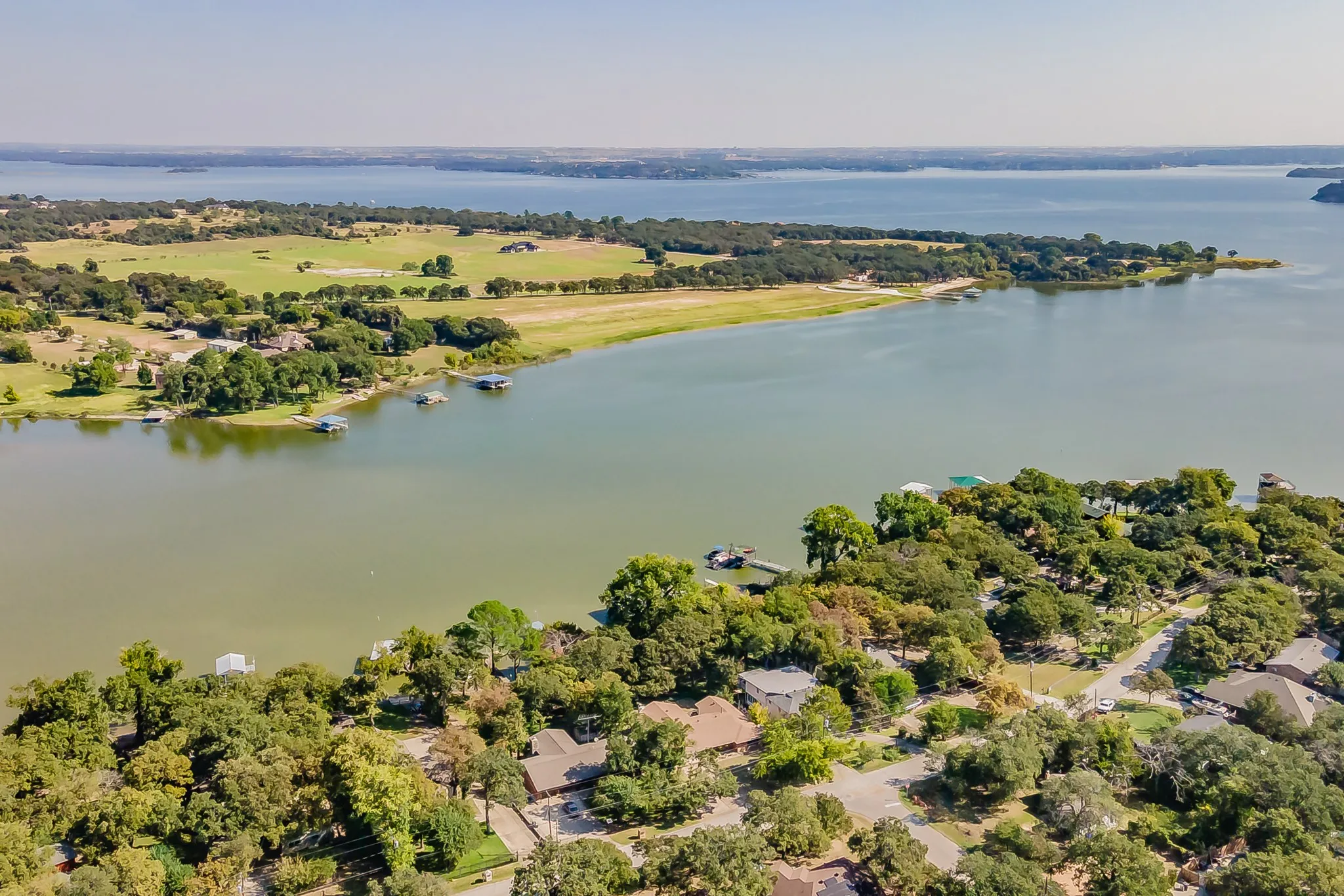 Bird's eye view of a large peaceful Stoner’s cove where the house is located.