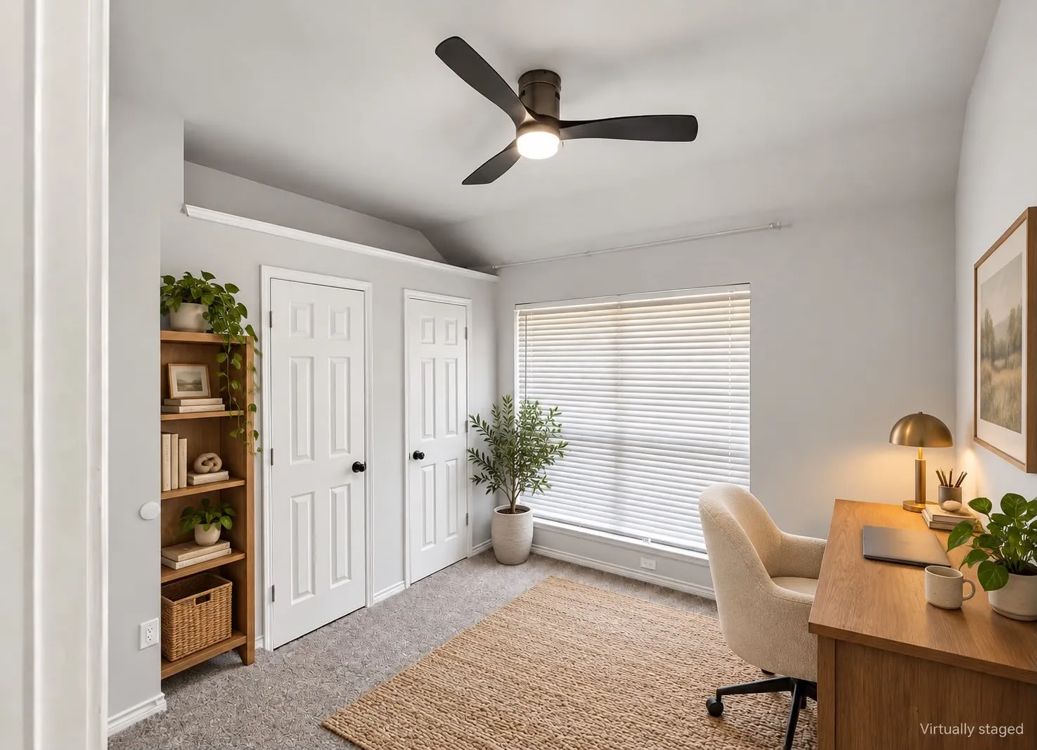 Vaulted ceiling with a contemporary ceiling fan, dual panel doors, window with blinds, and carpeted flooring
