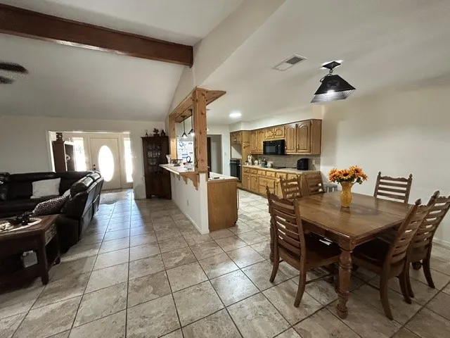 Dining area open to kitchen and living room.  All one great room for entertaining and family time.