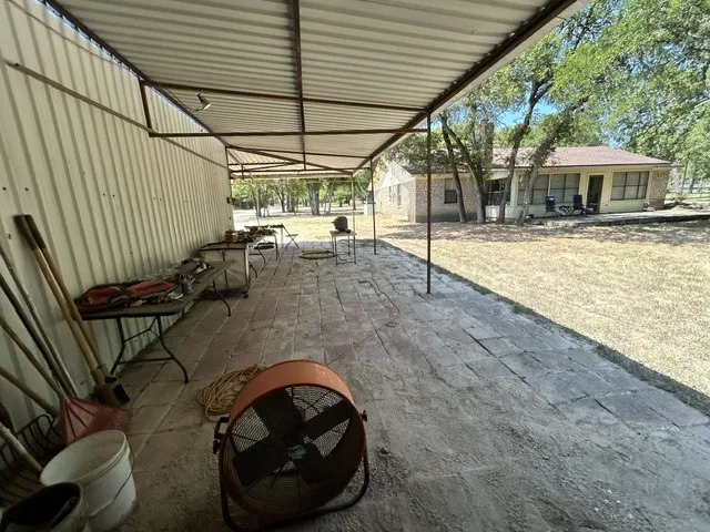 More "porch" area off the metal workshop.  If you had a pool put in, this could be the "cabana" area.  If you like that kind of thing.