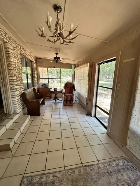 One half of the sunroom.  It is huge.  Approximately 27 feet long.  Imagine what you can do in this room.