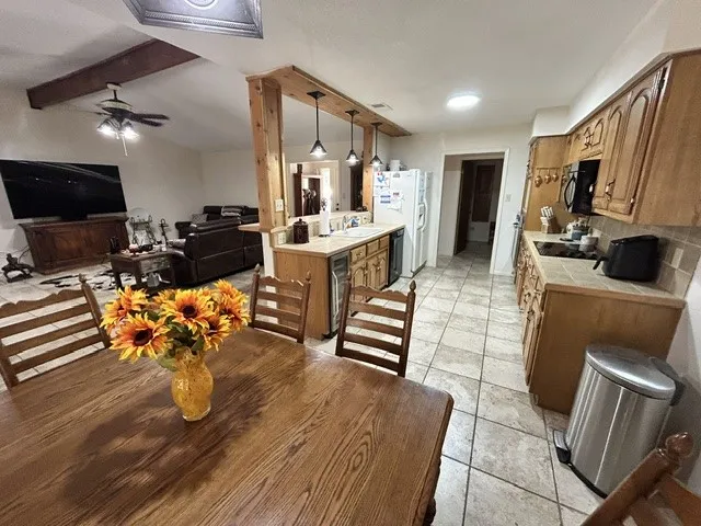 View of the kitchen from the dining area.