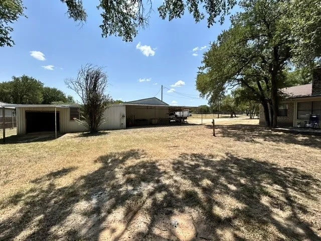 A view of the metal shop and equipment shed area.