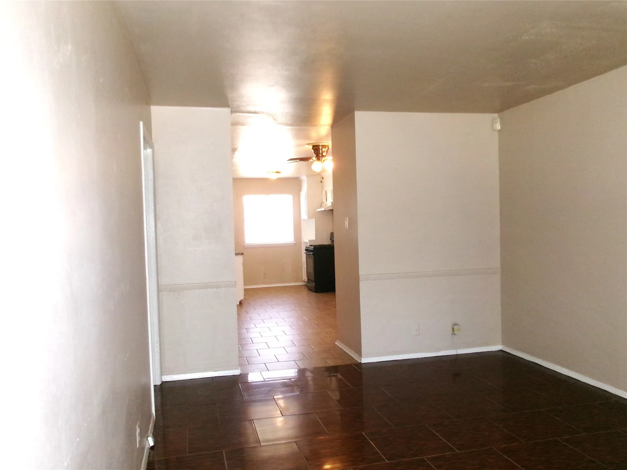 Living Room Looking into Kitchen and Dining