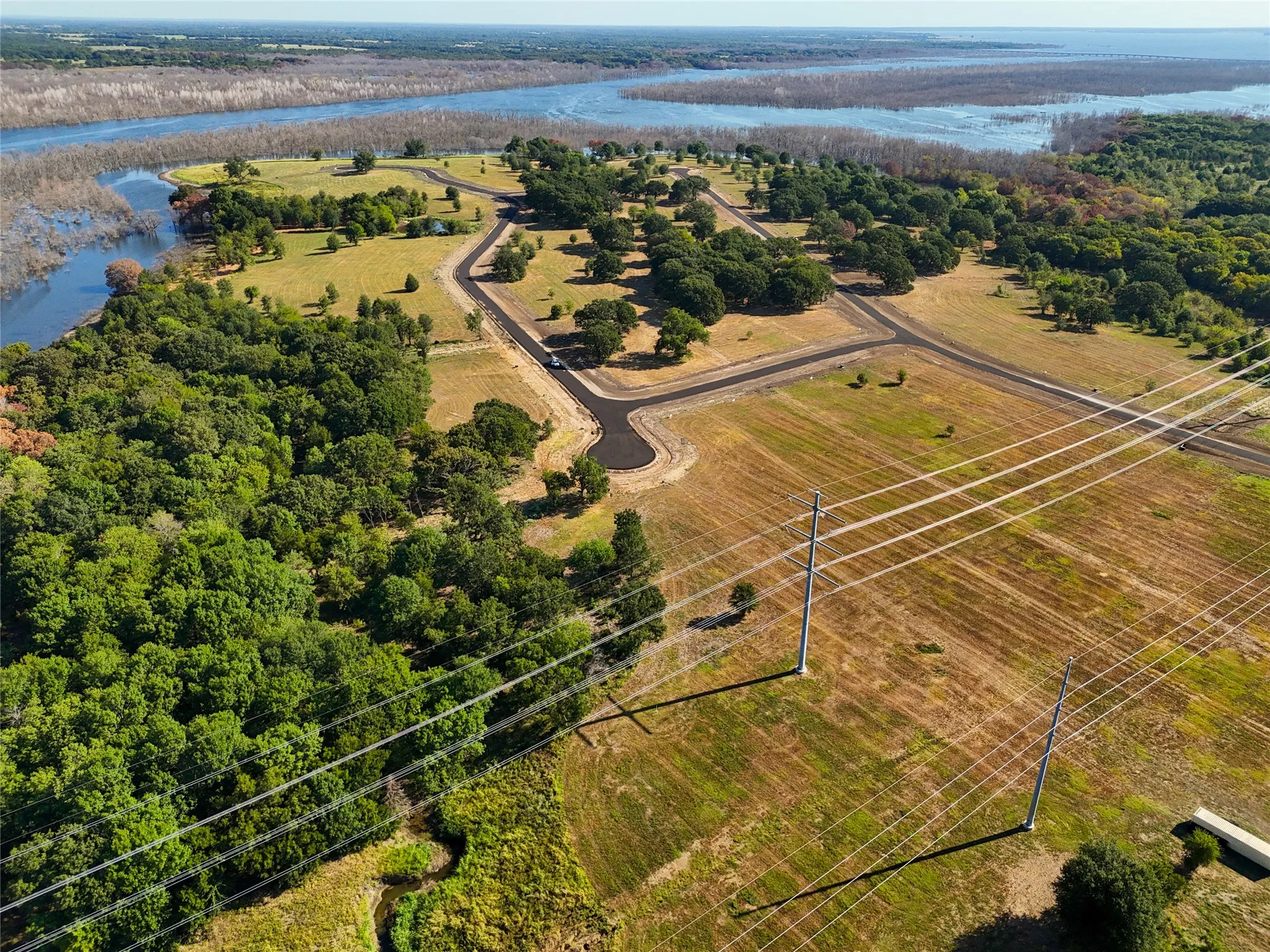 Bird's eye view featuring a water view and a rural view