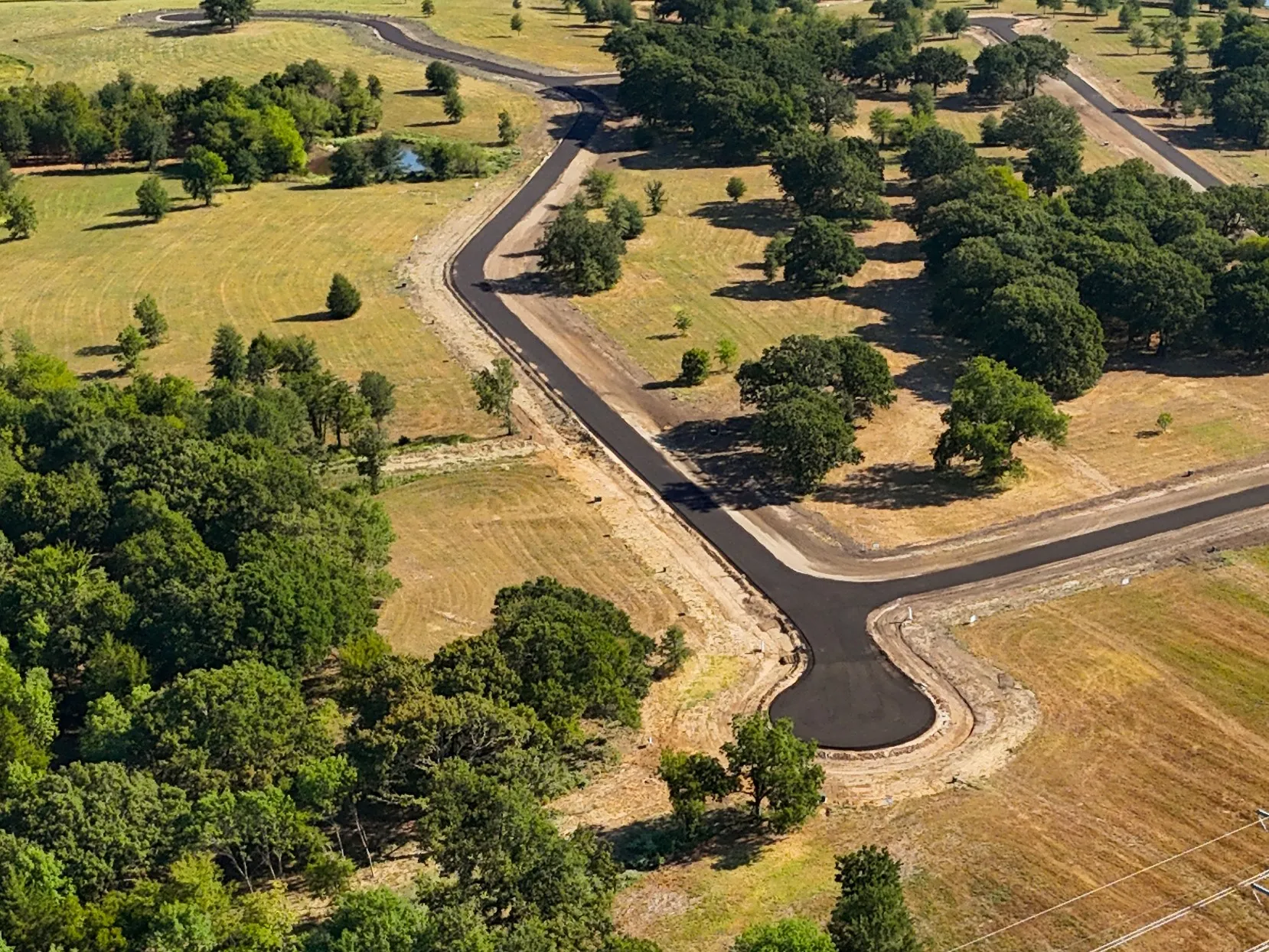Birds eye view of property featuring a rural view