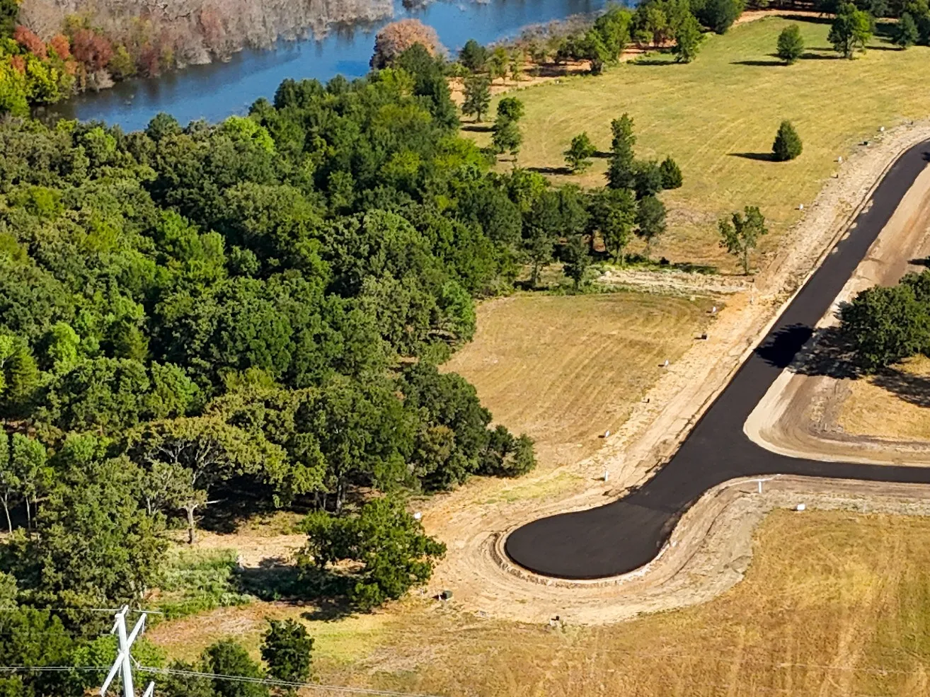 Drone / aerial view with a rural view and a water view