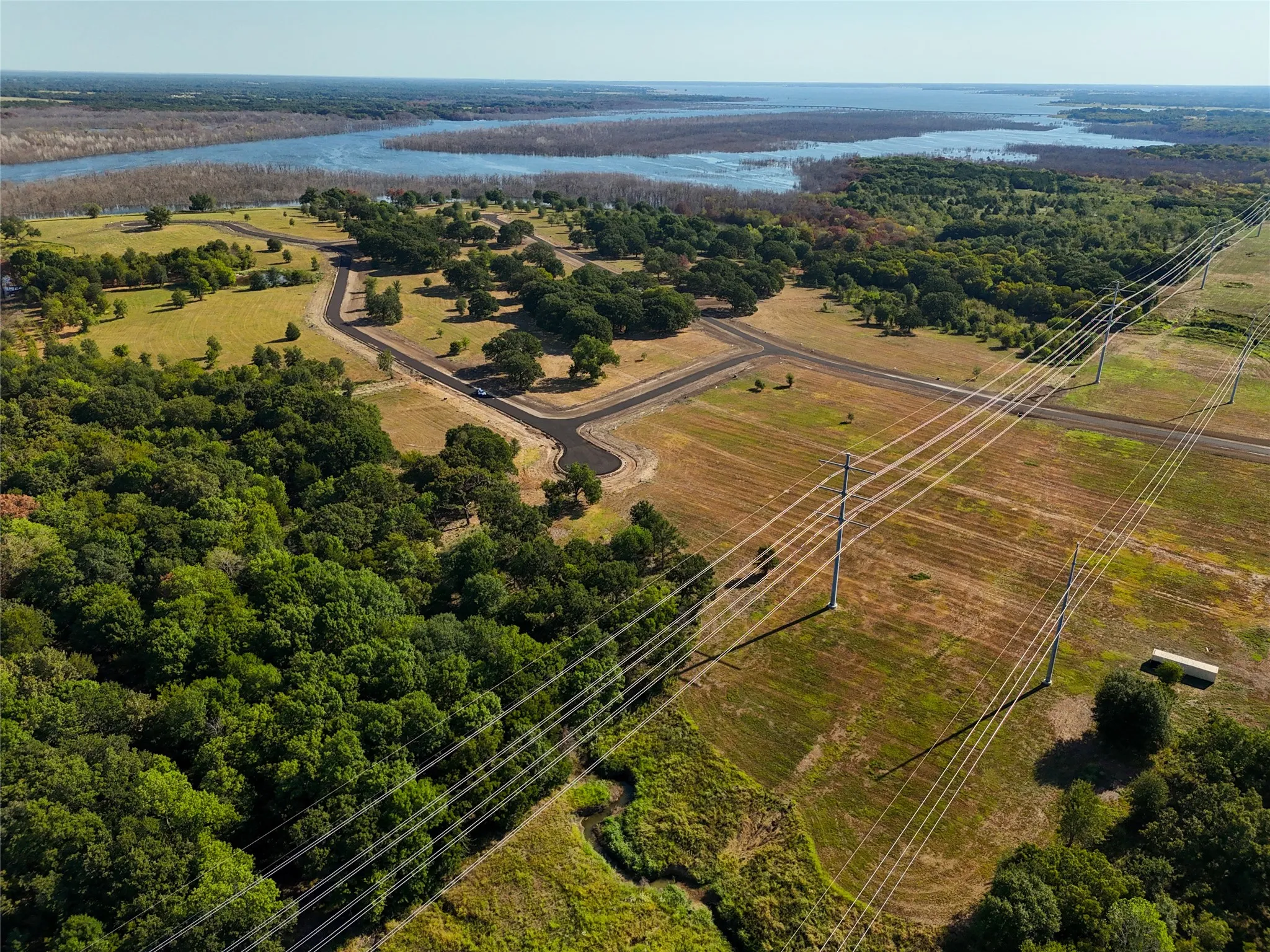 Bird's eye view featuring a water view and a rural view