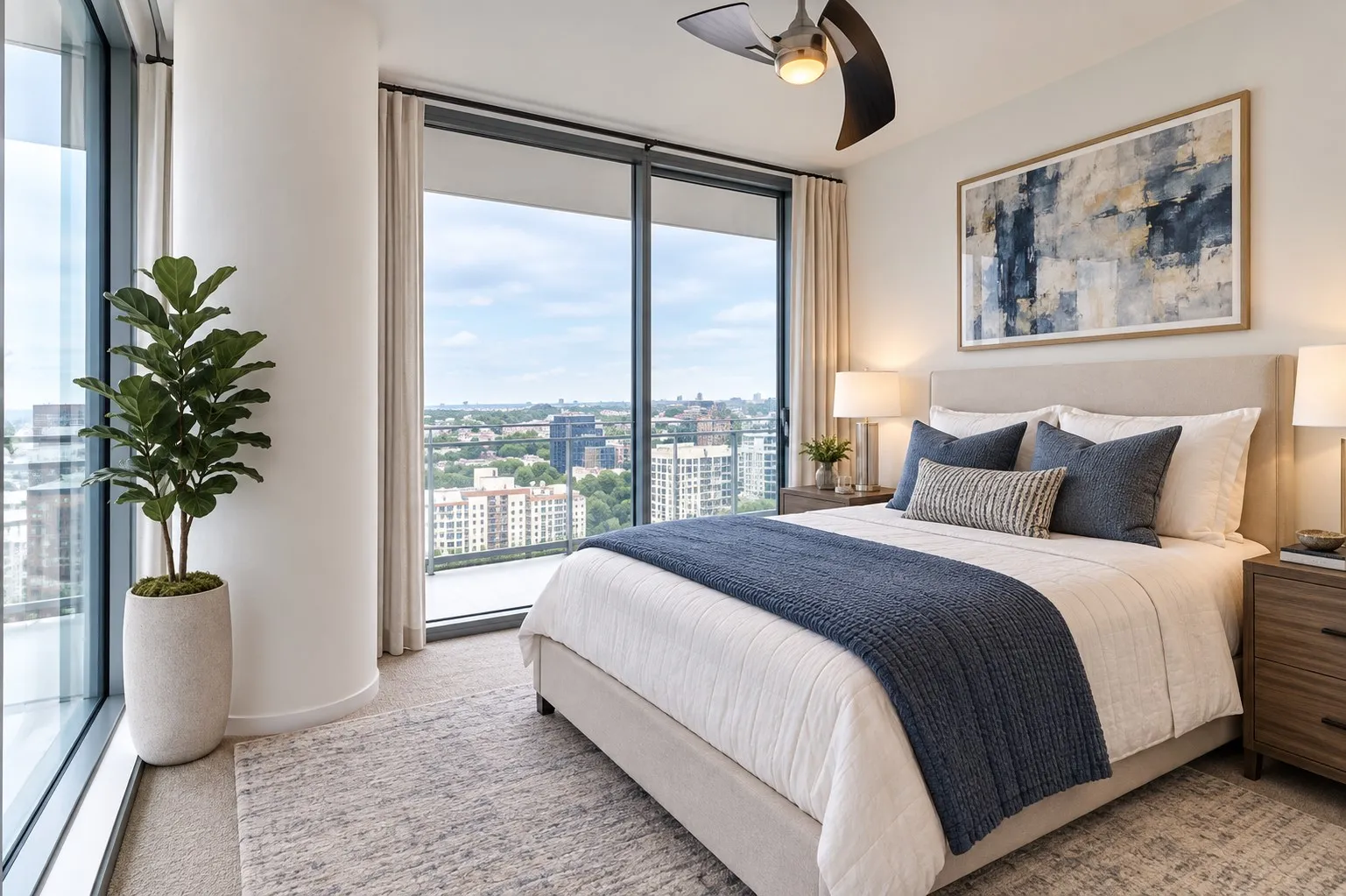 Floor-to-ceiling windows, outdoor balcony access, and a ceiling fan with integrated lighting