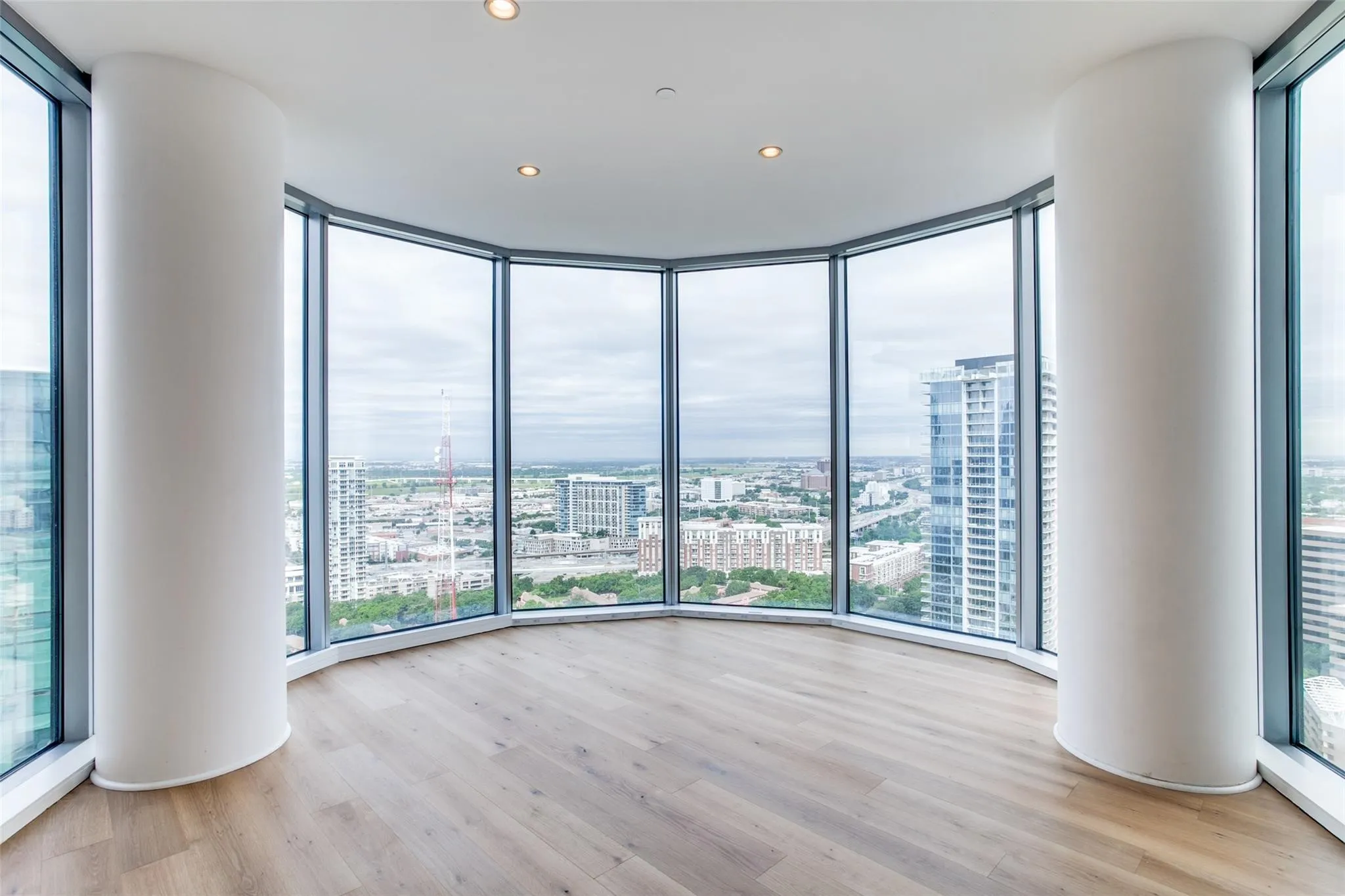 Floor-to-ceiling windows with a curved architectural design