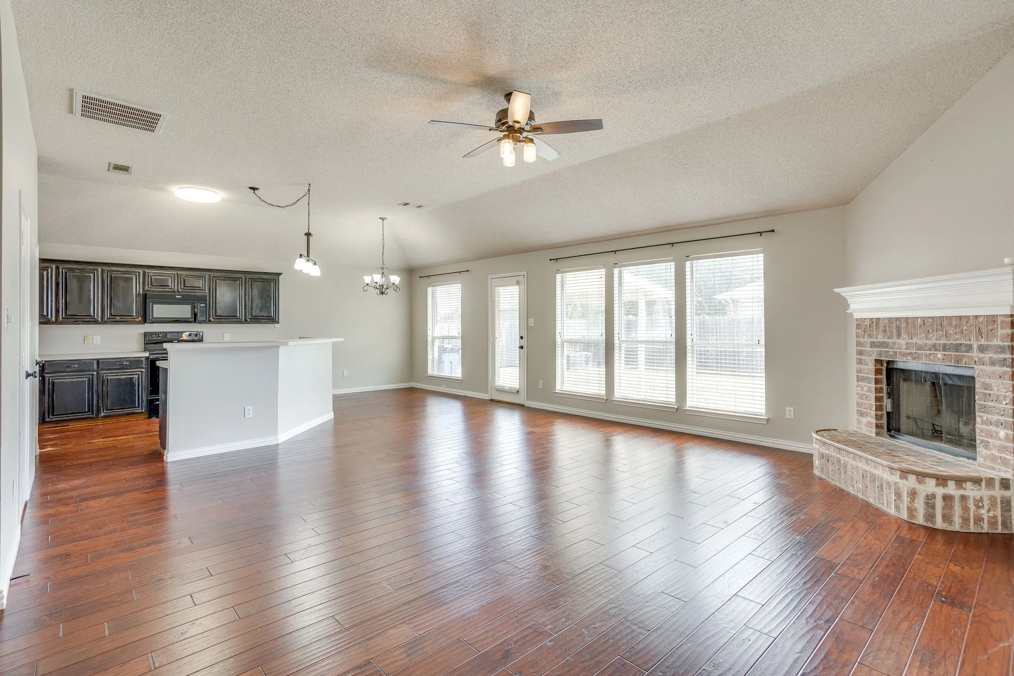 Open concept Living, kitchen, breakfast nook and Fireplace.