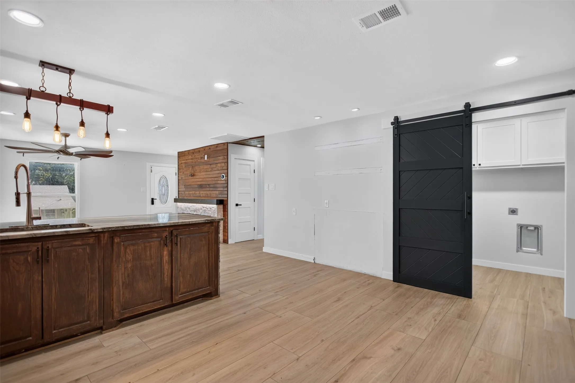 Granite Countertops, Modern lighting and faucet