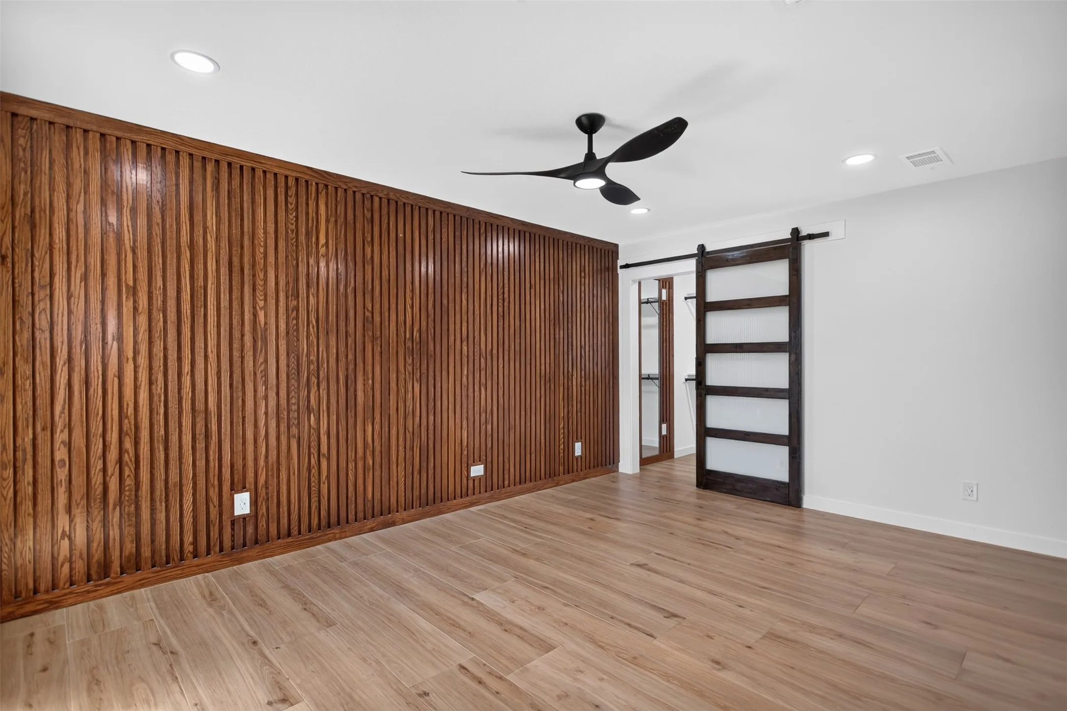Modern Primary bedroom, modern barn door