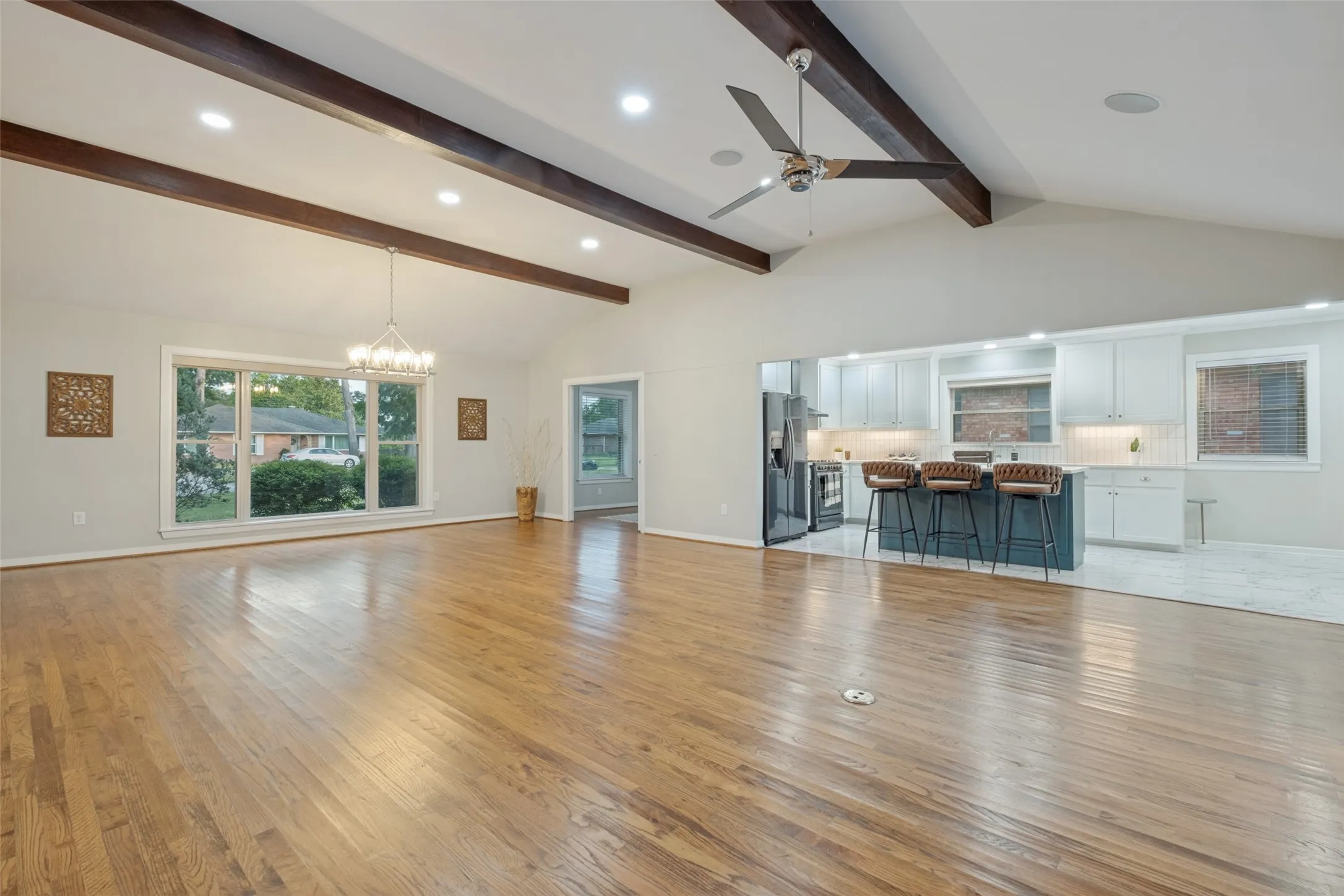 Corner of Living Area looking left to entry of office/flex space and kitchen.