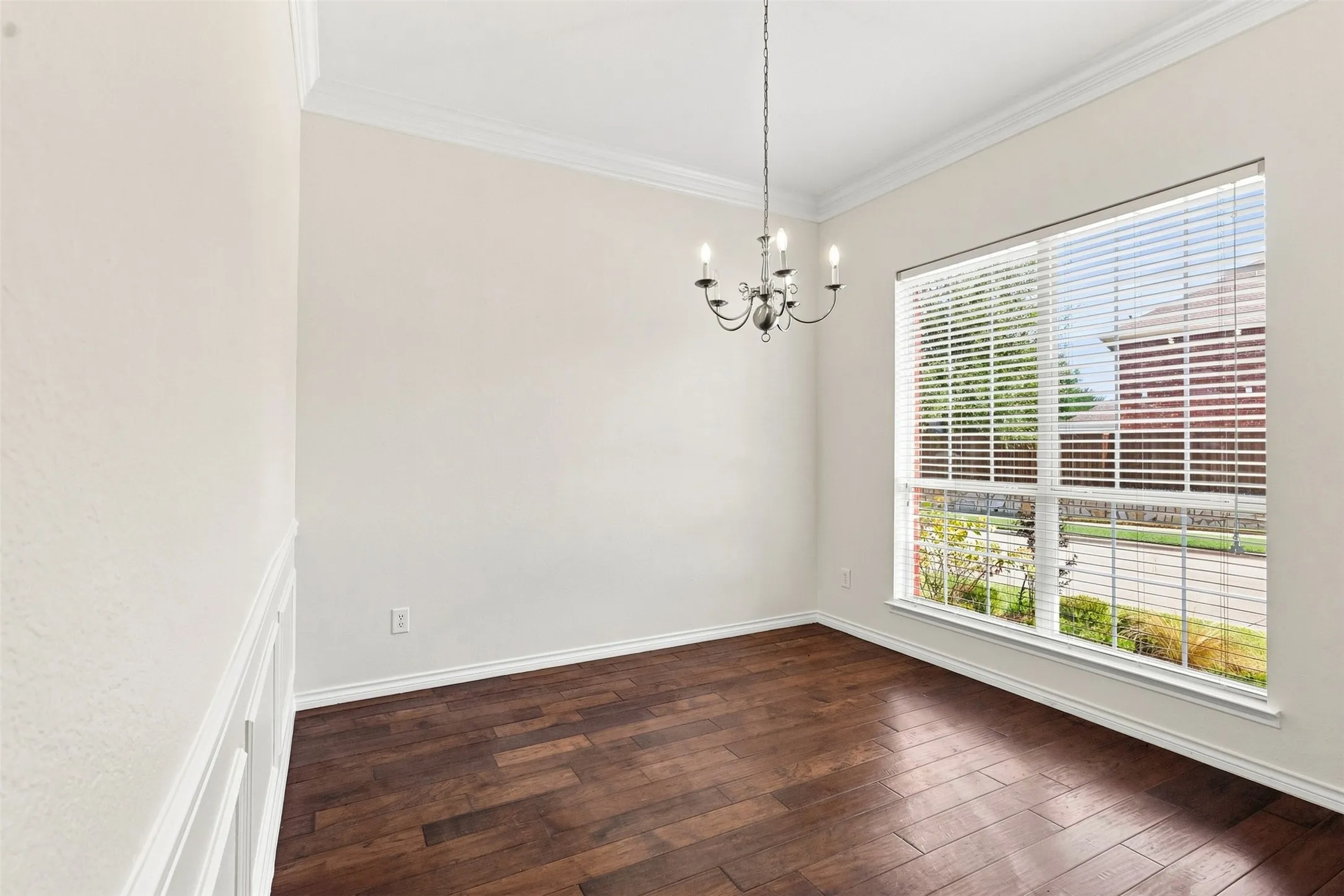 The dining room is just off the entrance and is open and bright with fresh paint in the entire home