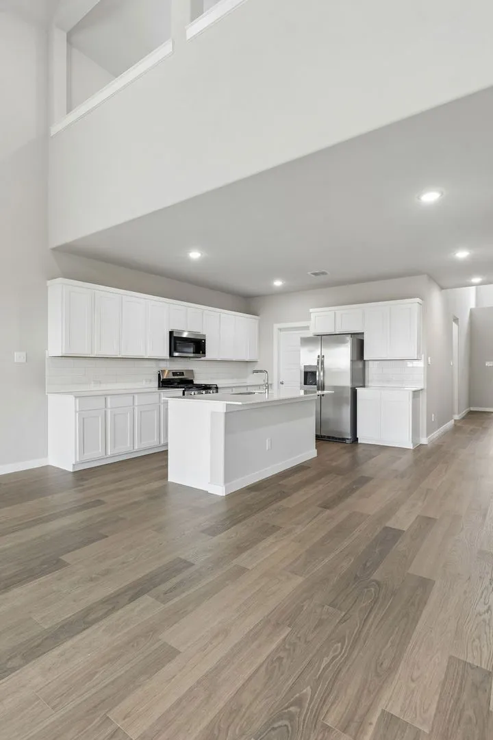 Kitchen in the Winters home plan by Trophy Signature Homes – REPRESENTATIVE PHOTO