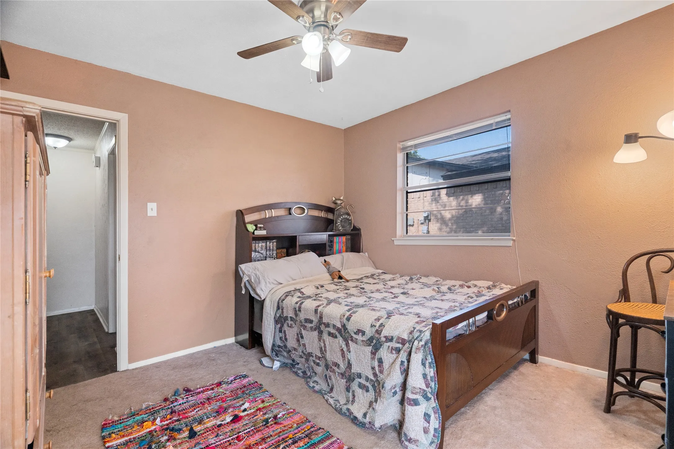 Bedroom #2 pops with contrasting paint and natural light.