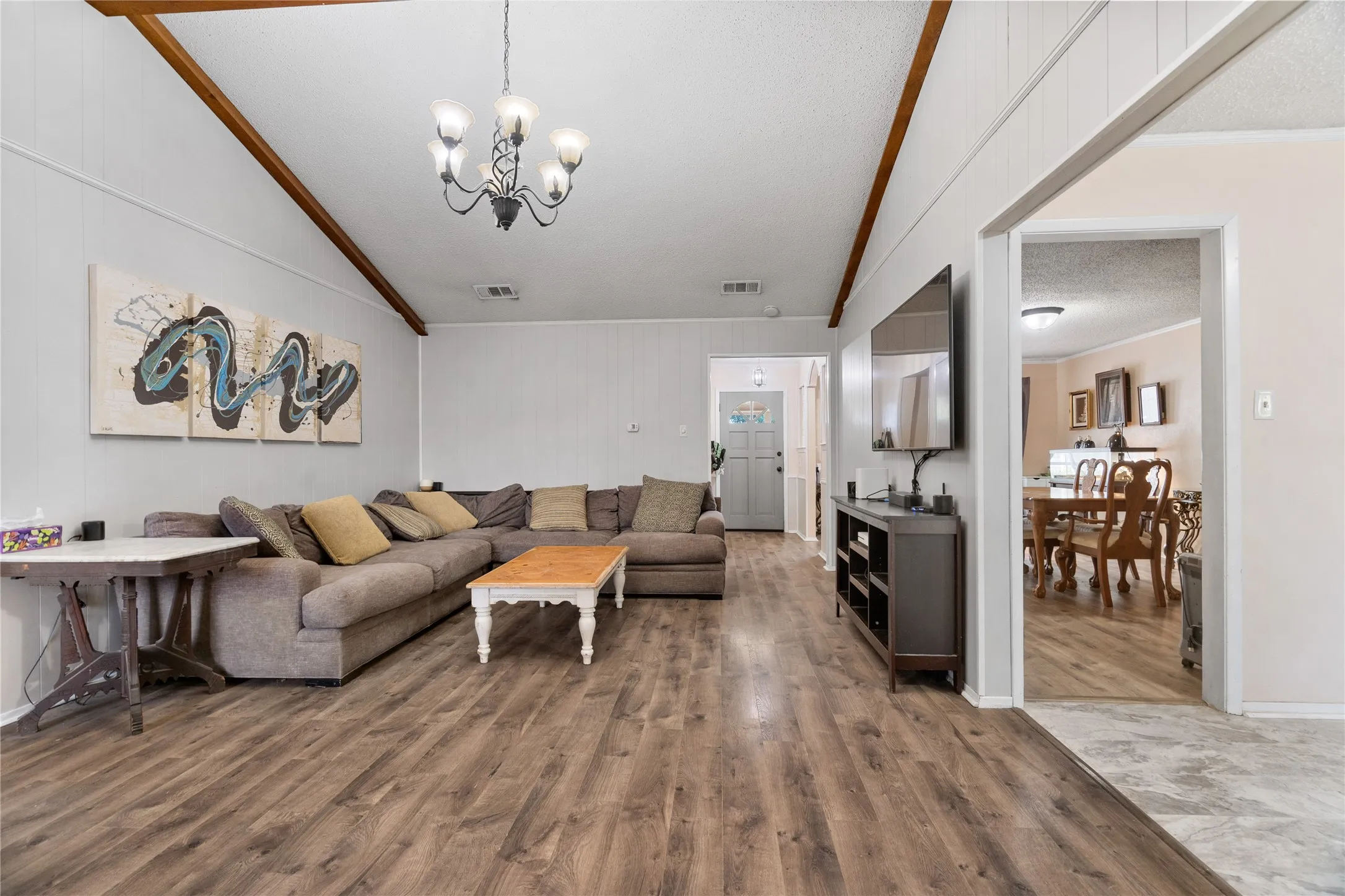 Open Living area with easy access from entry and formal dining