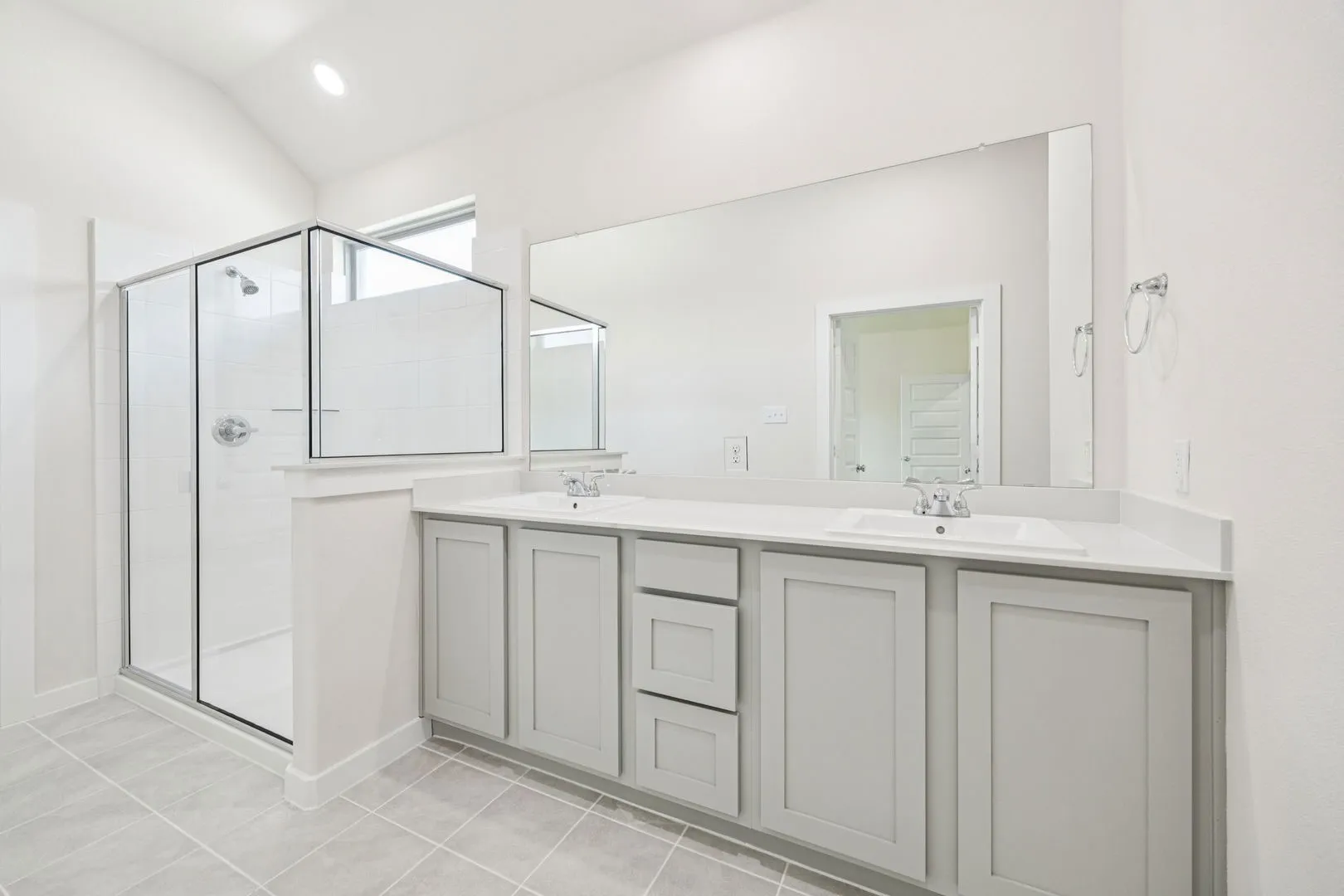 Primary Bathroom in the Claret home plan by Trophy Signature Homes – REPRESENTATIVE PHOTO