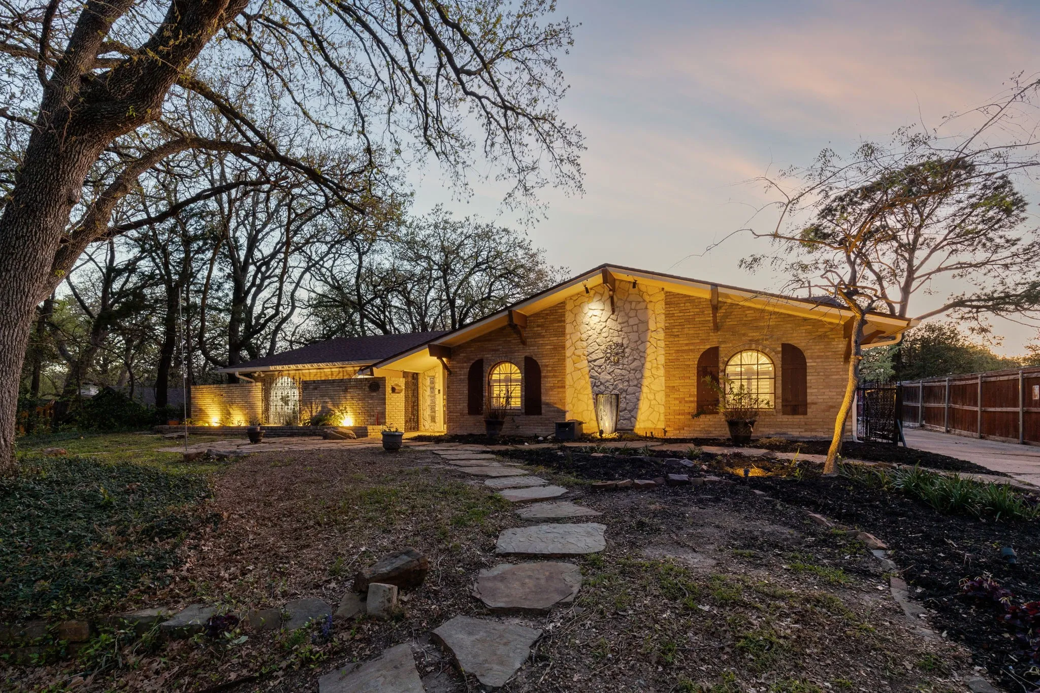 View of front of house with stone siding