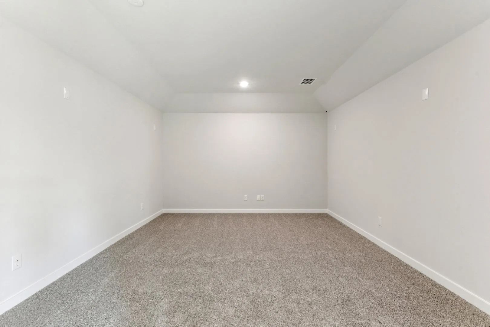 Media Room in the Wimbledon home plan by Trophy Signature Homes – REPRESENTATIVE PHOTO