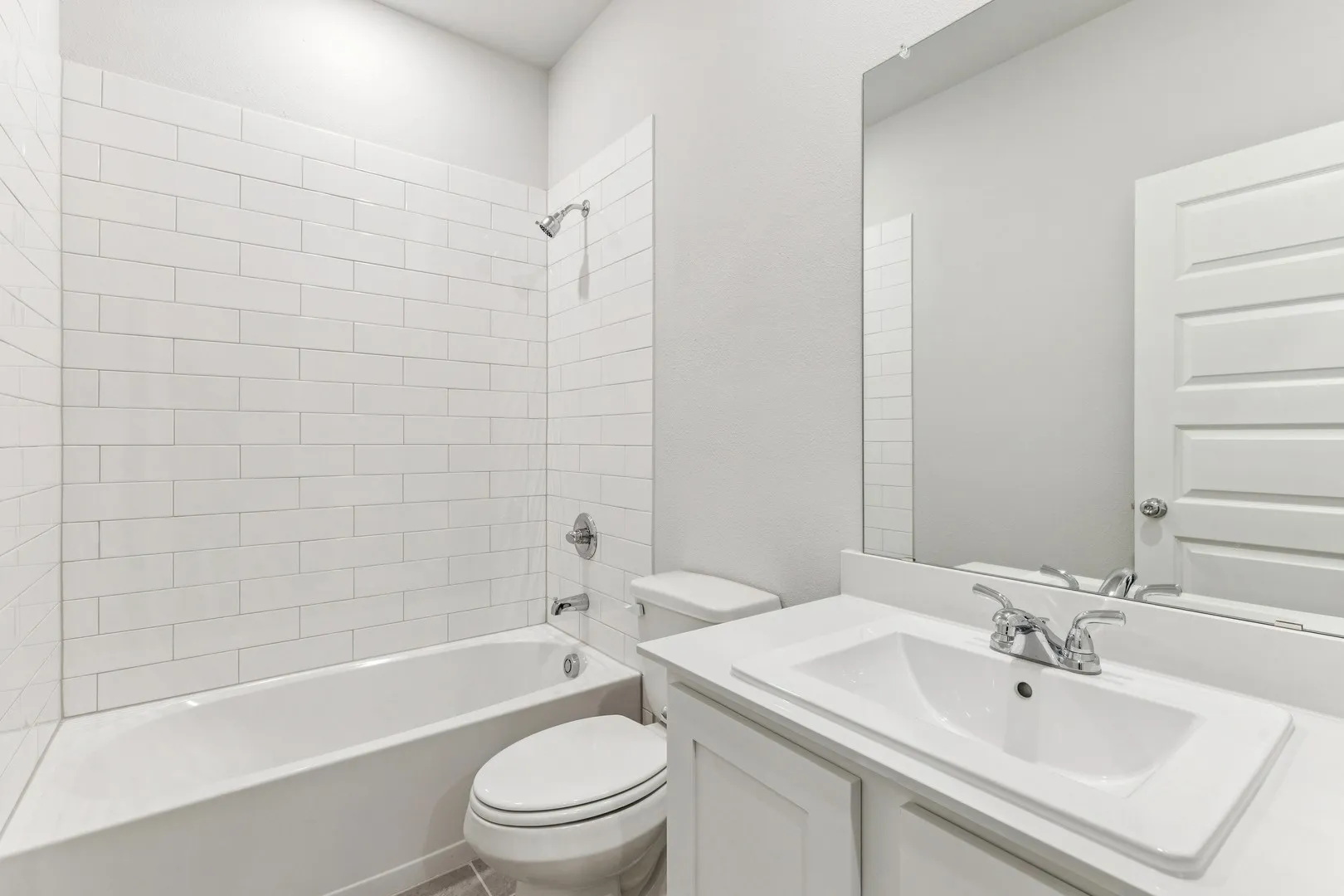 Bathroom in the Wimbledon home plan by Trophy Signature Homes – REPRESENTATIVE PHOTO