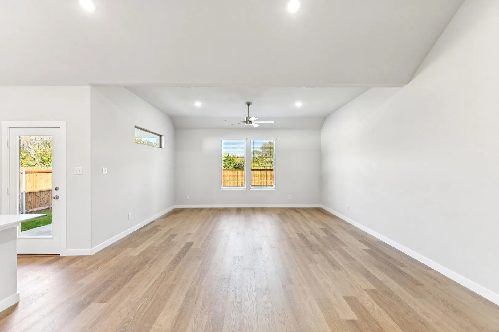 Living and Dining Rooms in the Wimbledon home plan by Trophy Signature Homes – REPRESENTATIVE PHO