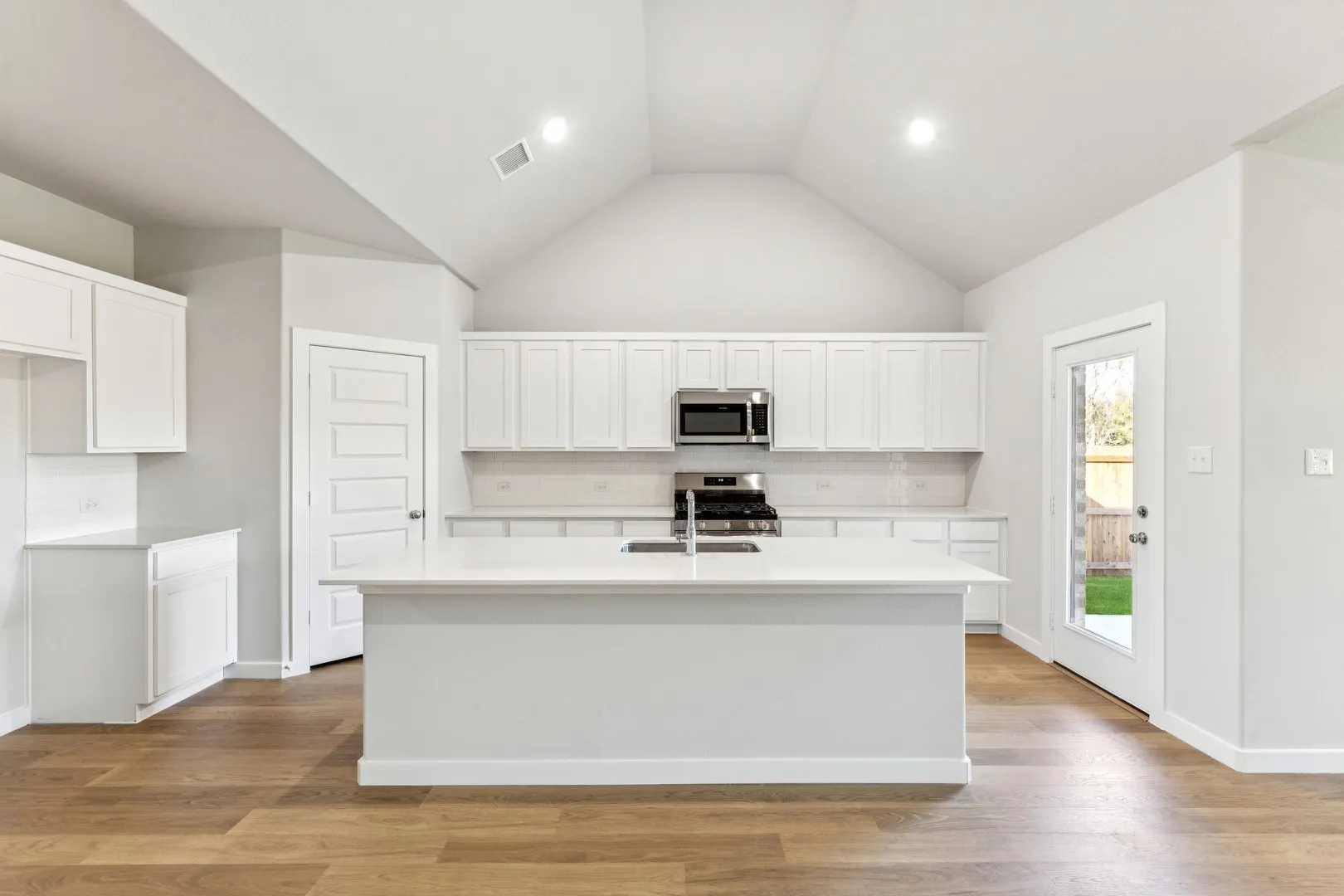 Open First Floor in the Wimbledon home plan by Trophy Signature Homes – REPRESENTATIVE PHOTO