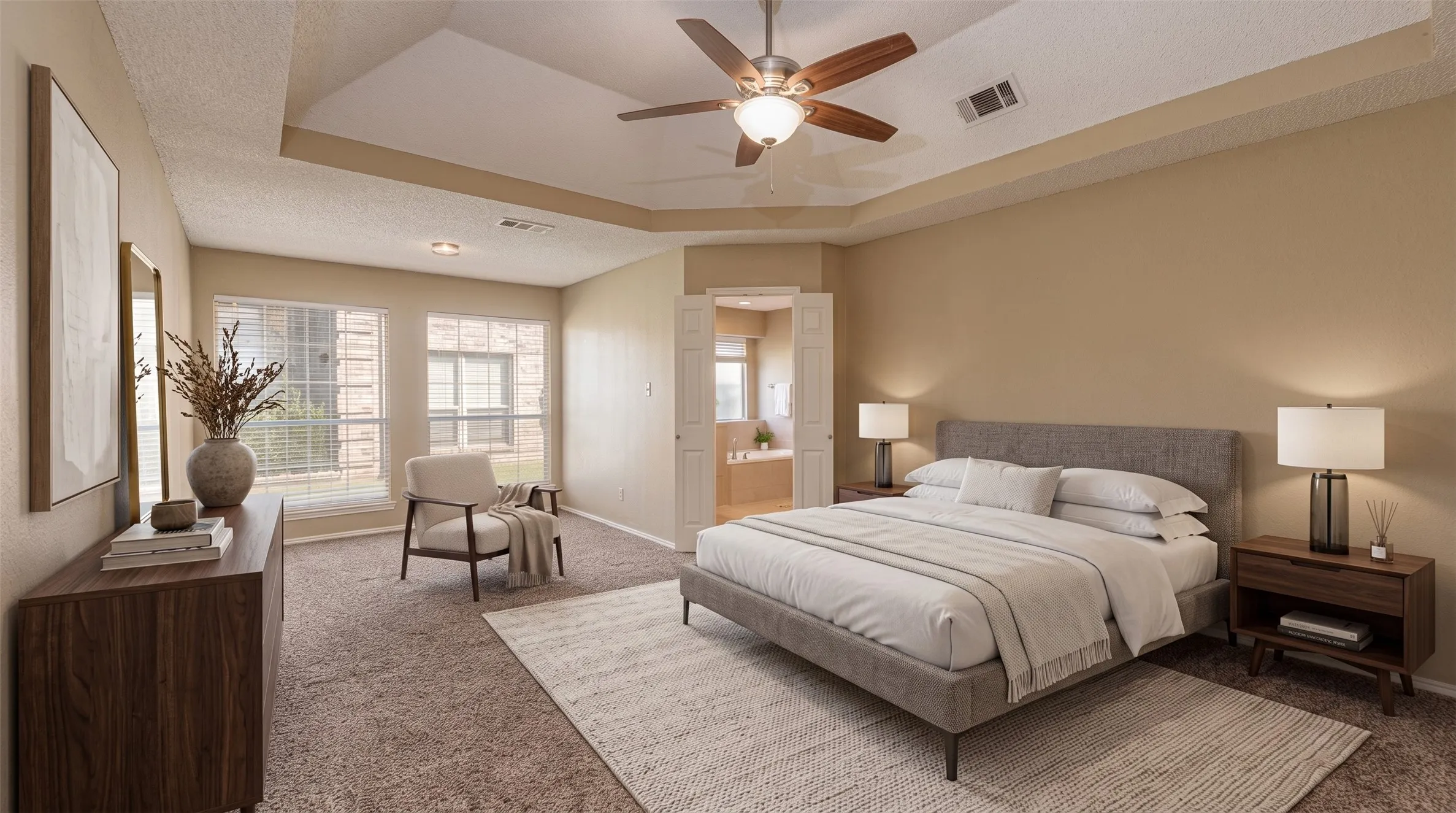 Primary Bedroom with spacious sitting area. Virtual staged