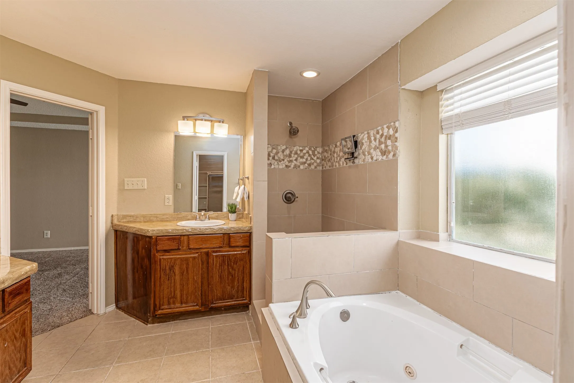 shower and tub. Dual vanities