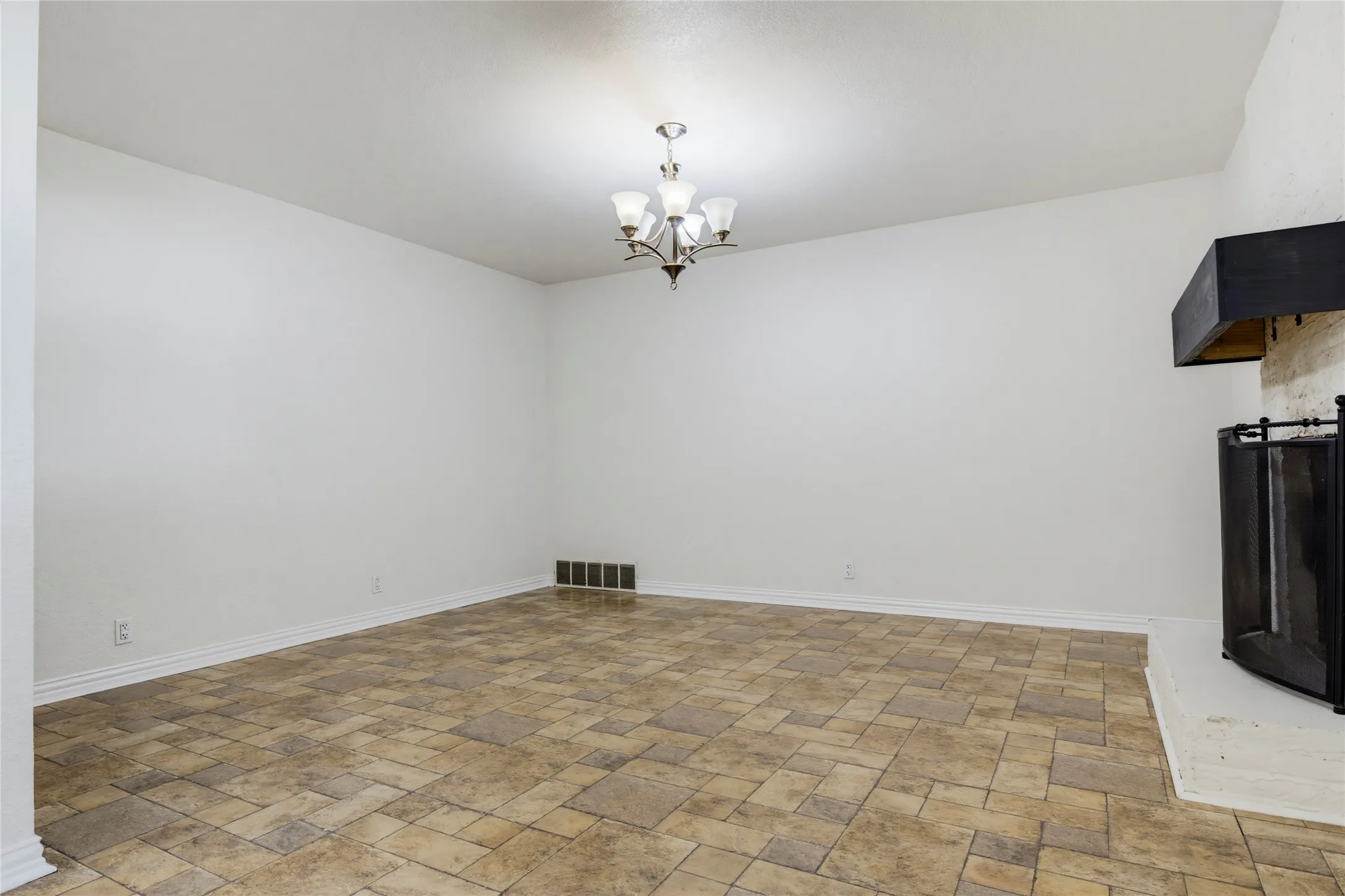 Secondary living area with wood burning fireplace
