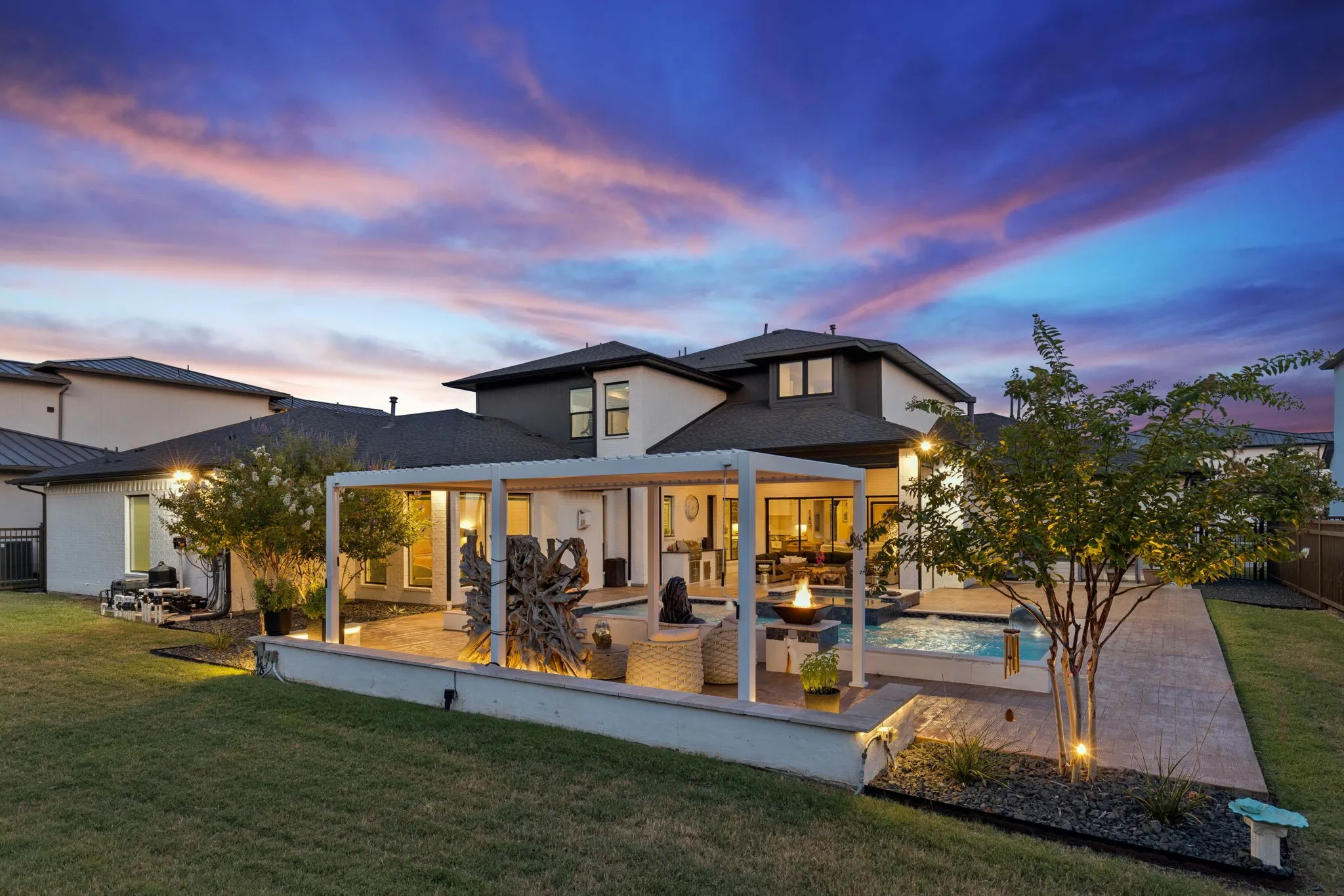 Pool has remote access to control pool heater, adjust spa settings, and to select color-changing LED lights.
