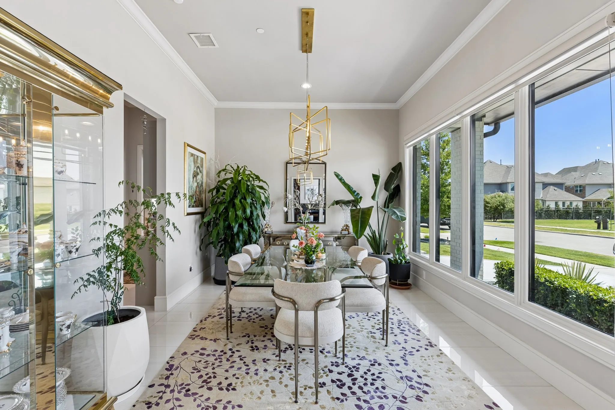 The formal dining room seats larger groups and opens seamlessly to the kitchen through the butler's pantry for ease of serving guests.