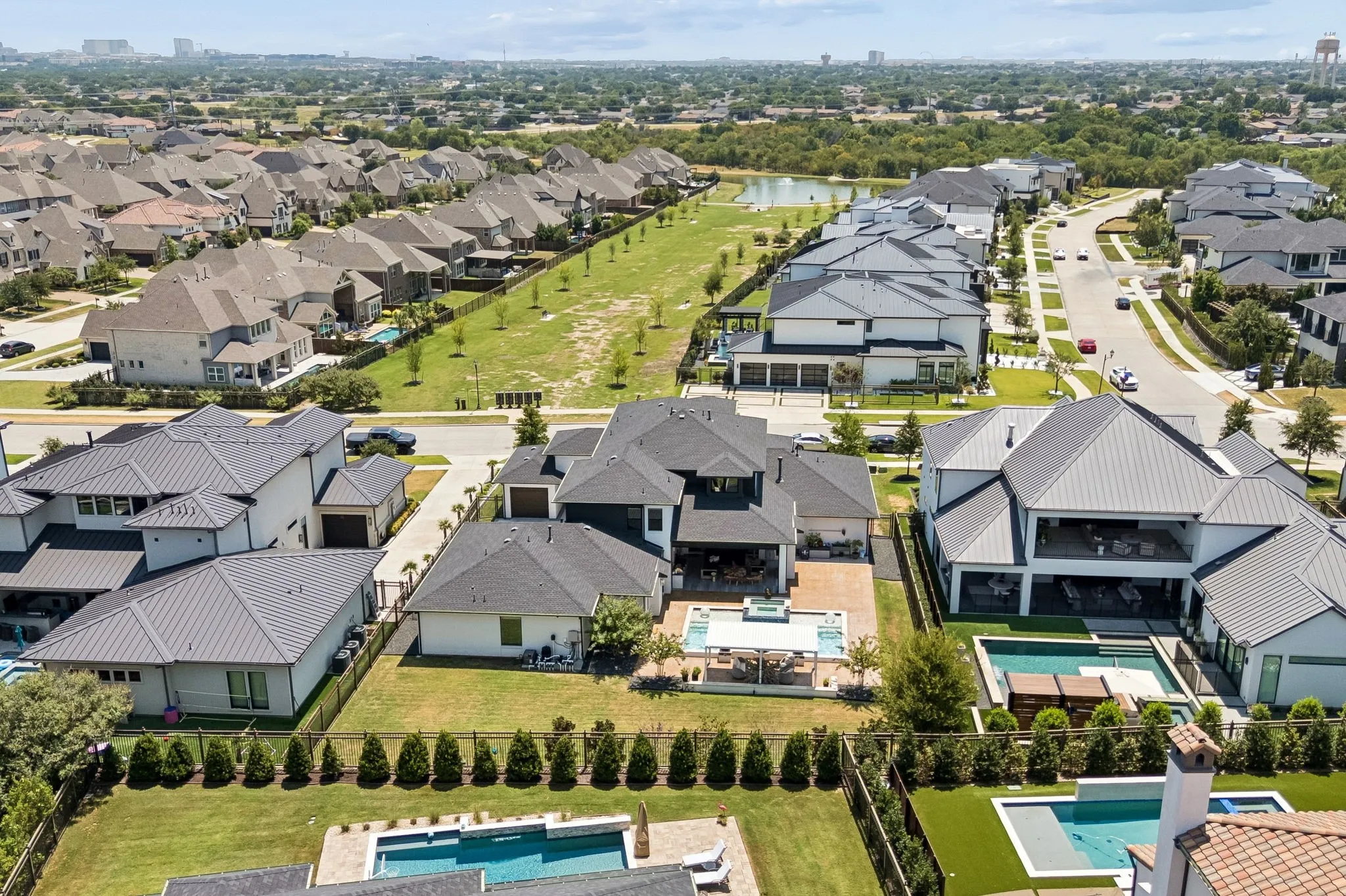 Within walking distance to serene neighborhood pond.