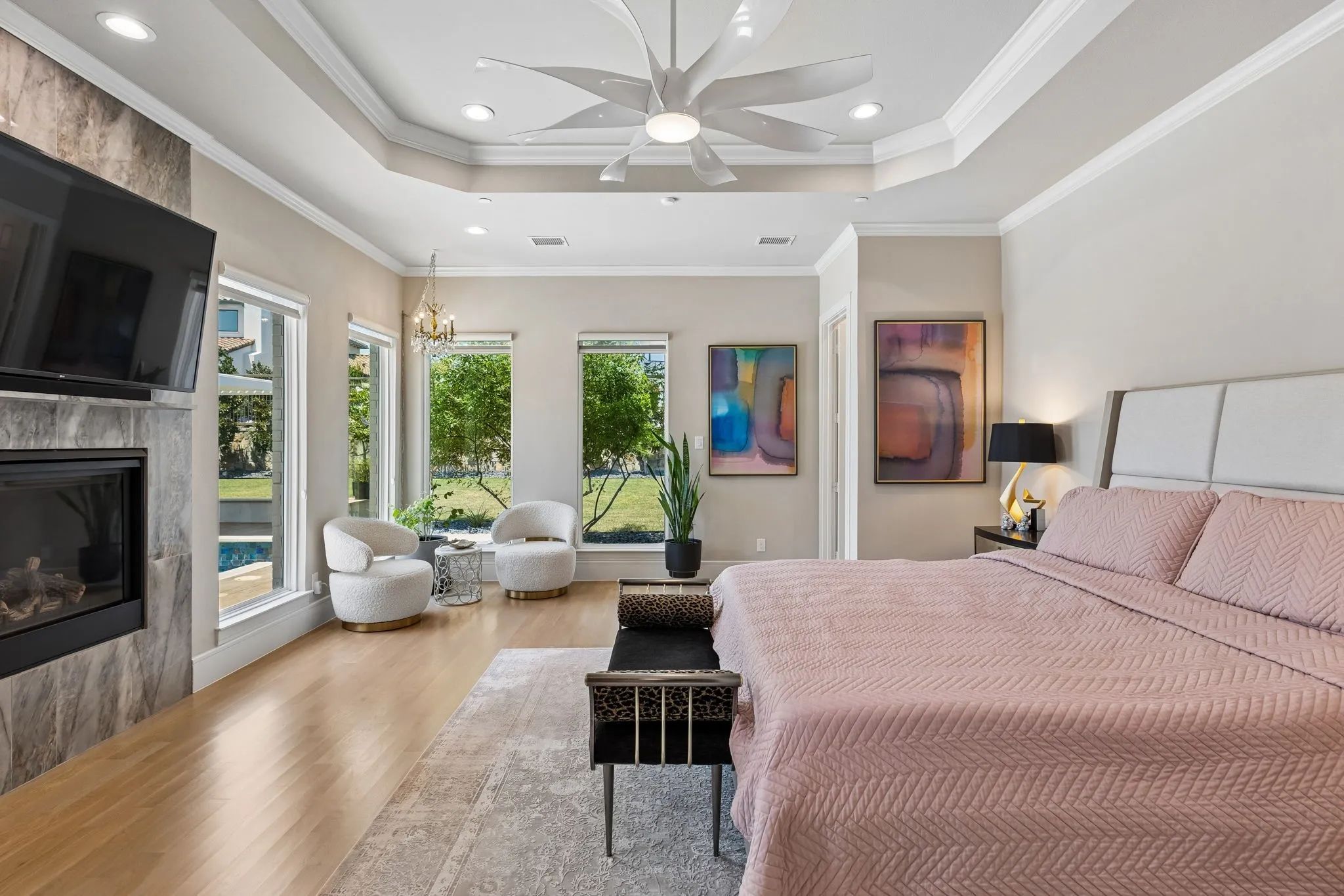 Wood flooring extends into the primary suite.