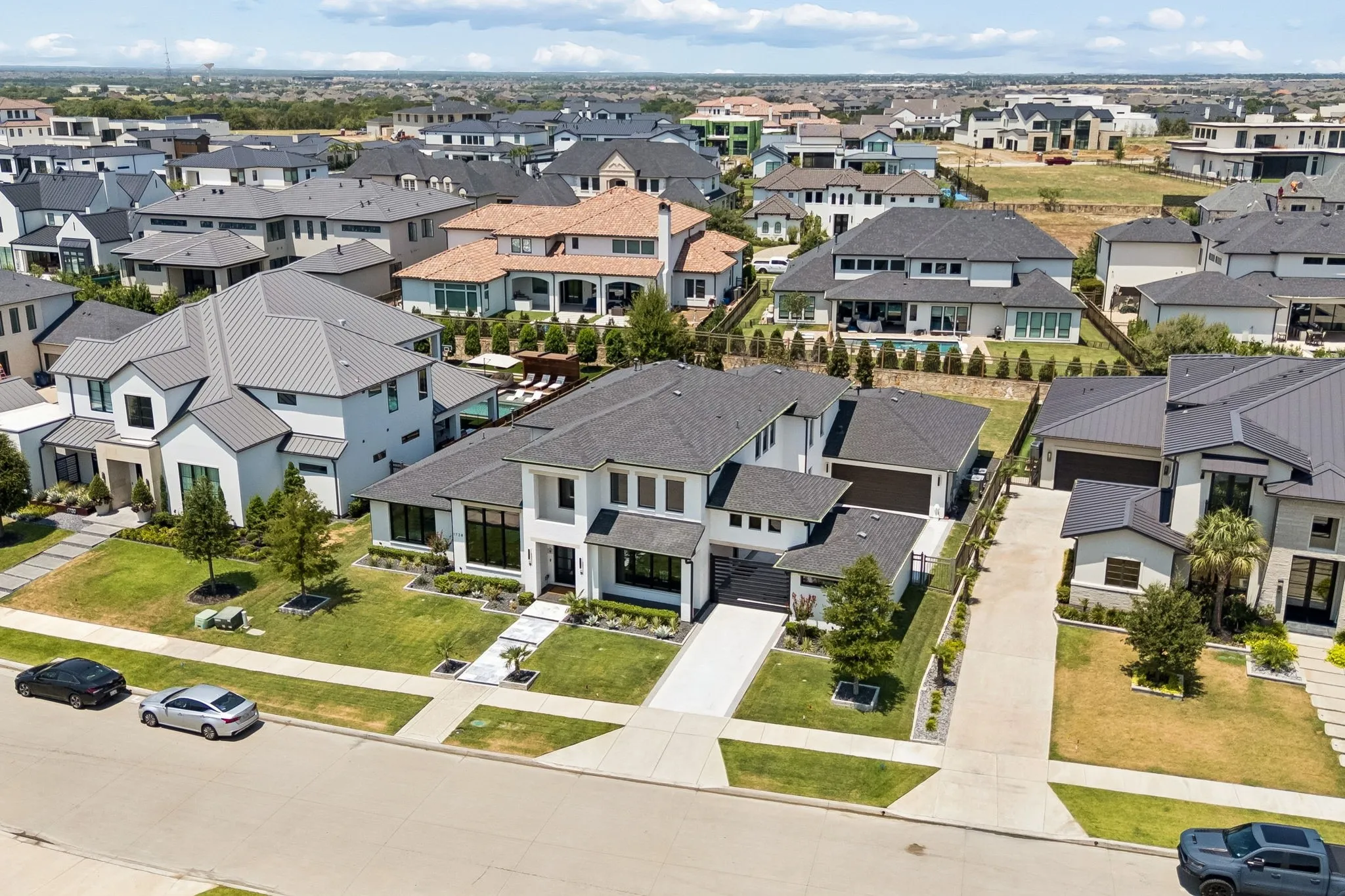 This upscale 24-hour guarded-gated community offers both serenity & privacy yet is conveniently located with easy access to The Star, Legacy West, DFW airport, & world class shopping & dining!