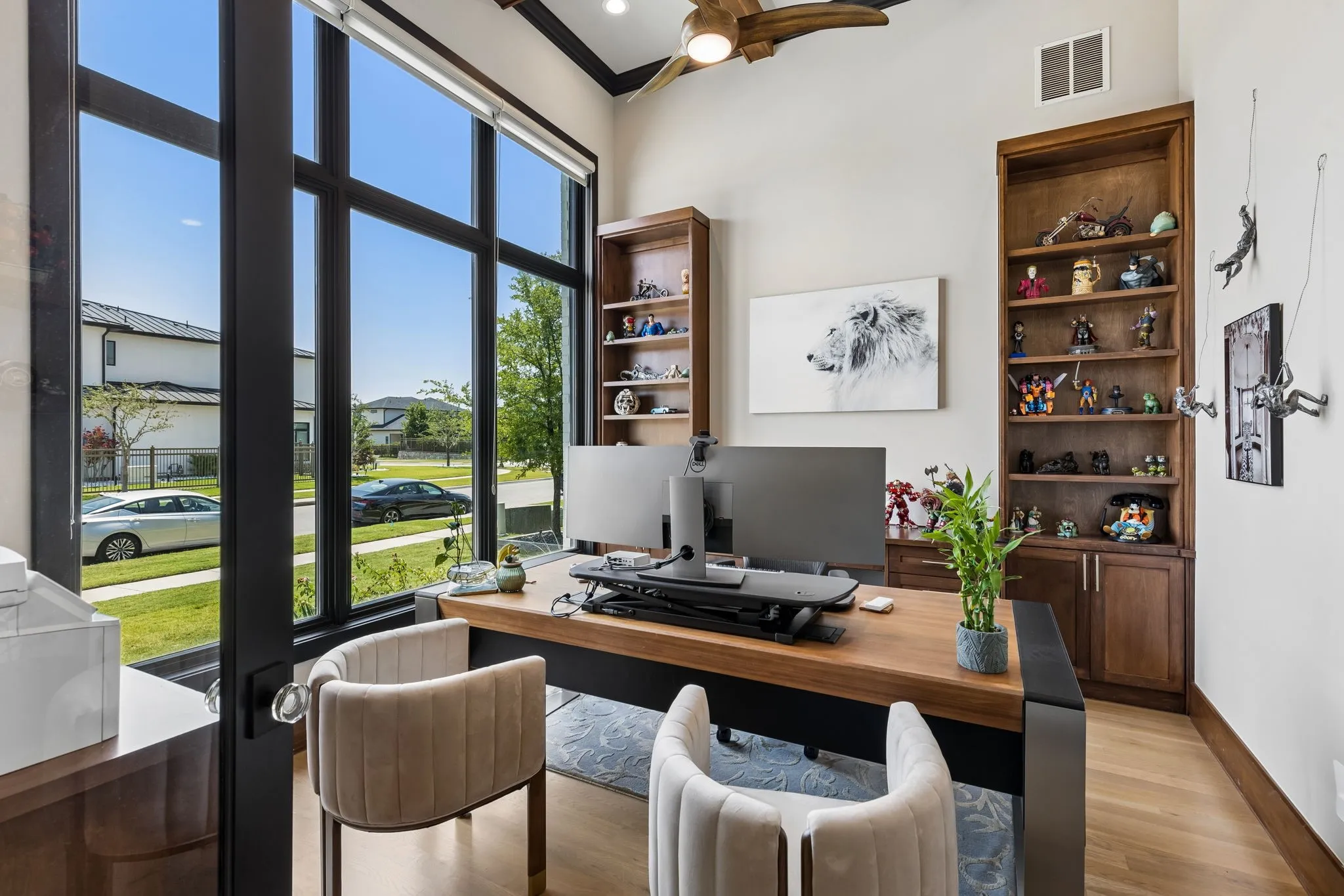 Beautiful built-ins provide storage and display space in the office.